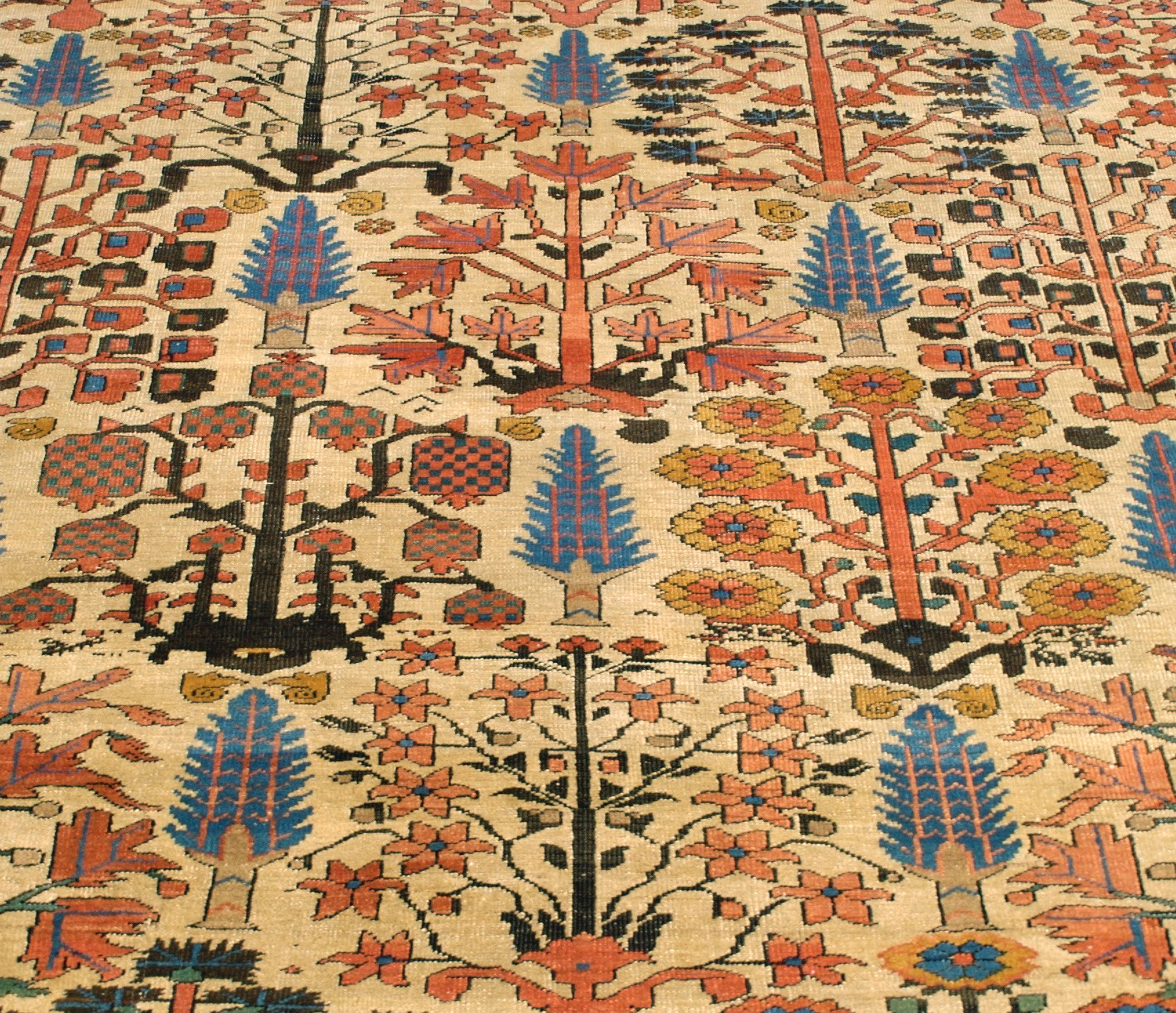 Field detail of an antique Bashaish carpet with a Shrub and Flower design on an ivory field. Heriz area, northwest Persia, late 19th century - Douglas Stock Gallery, antique Persin carpets Boston,MA area