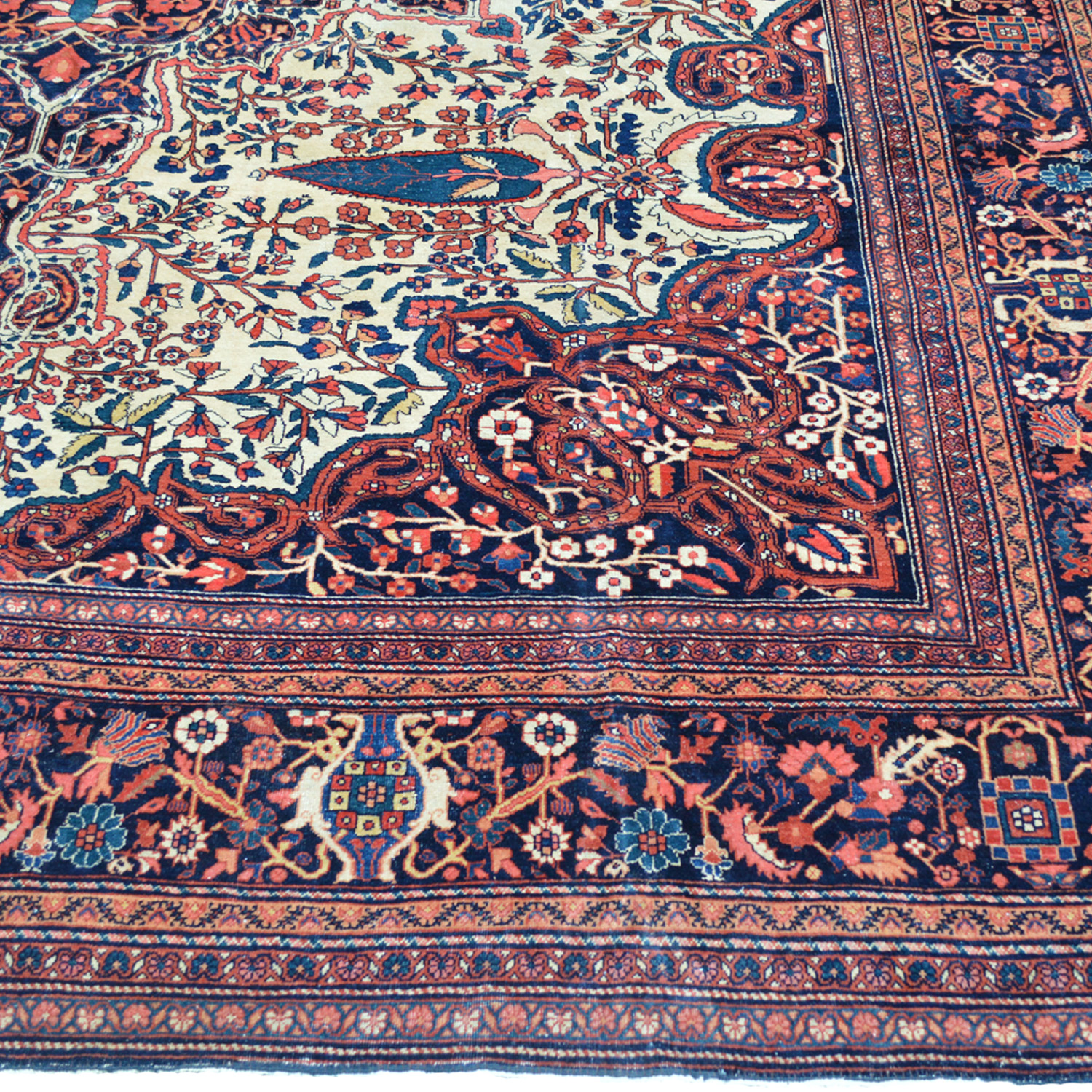 Corner spandrel detail from an antique Persian Fereghan Sarouk carpet