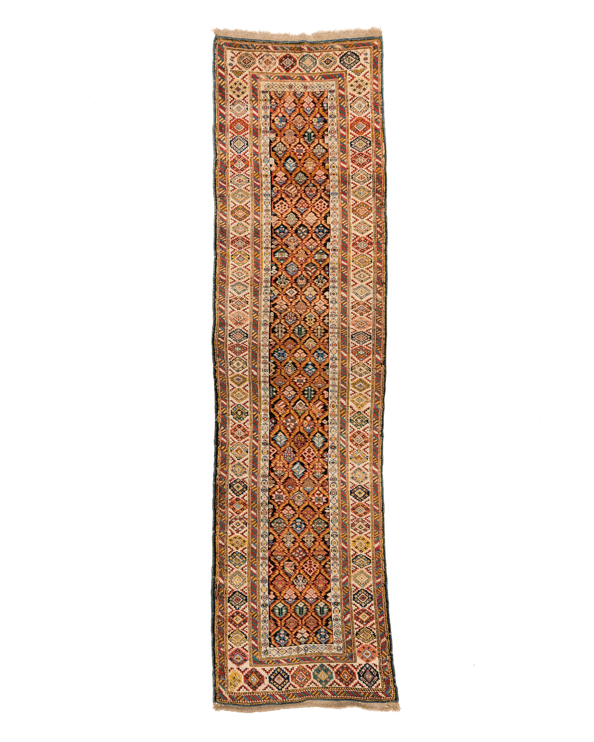 19th century Caucasian Kuba runner with a lattice design on an oxifdized brown field that is framed by an ivory border.