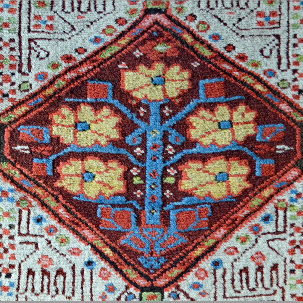 Aubergine color medallion from an antique Persian Serab runner