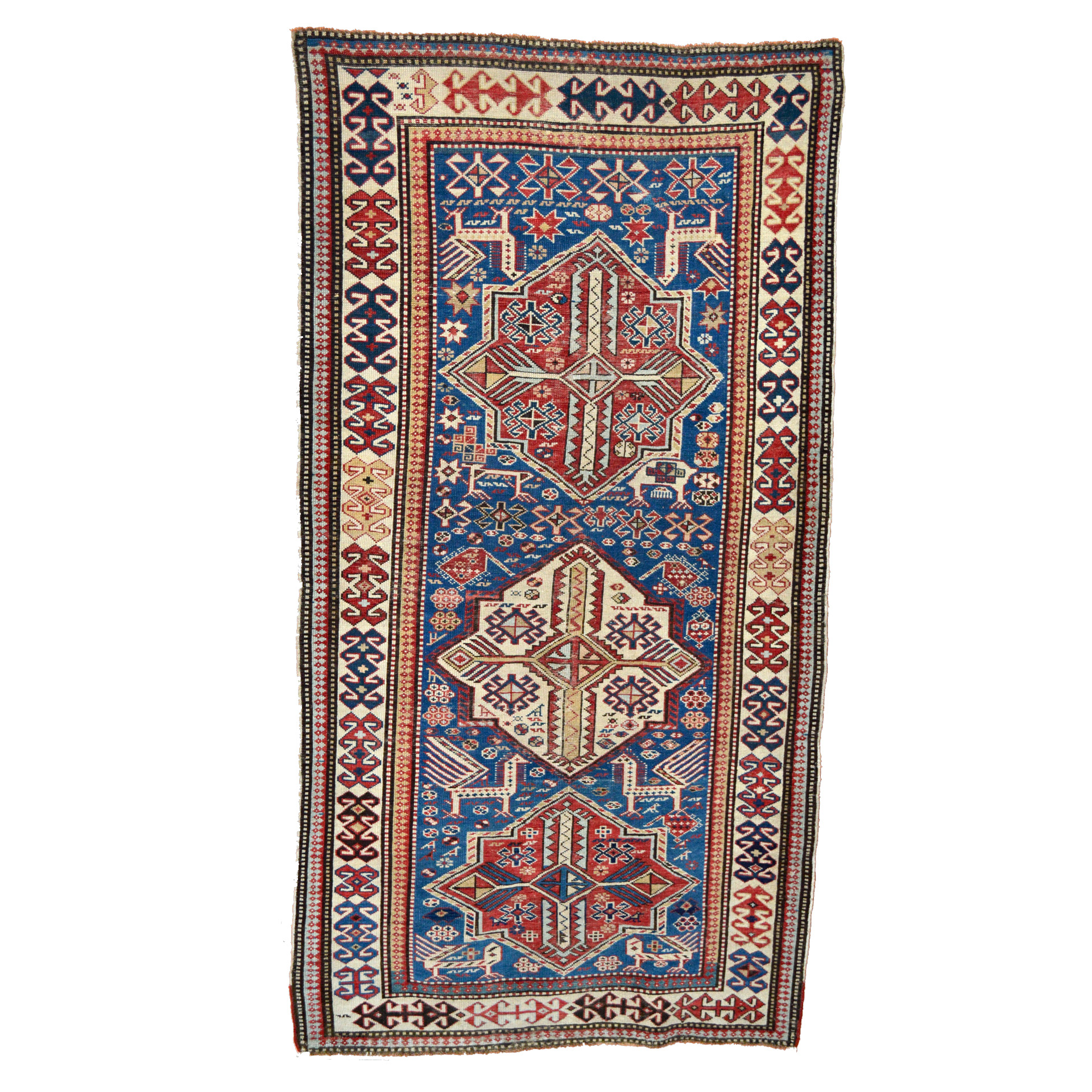 An antique Akstafa rug from the northeast Caucasus with an uncommon denim blue field - Douglas Stock Gallery, antique Oriental rugs Boston,MA area