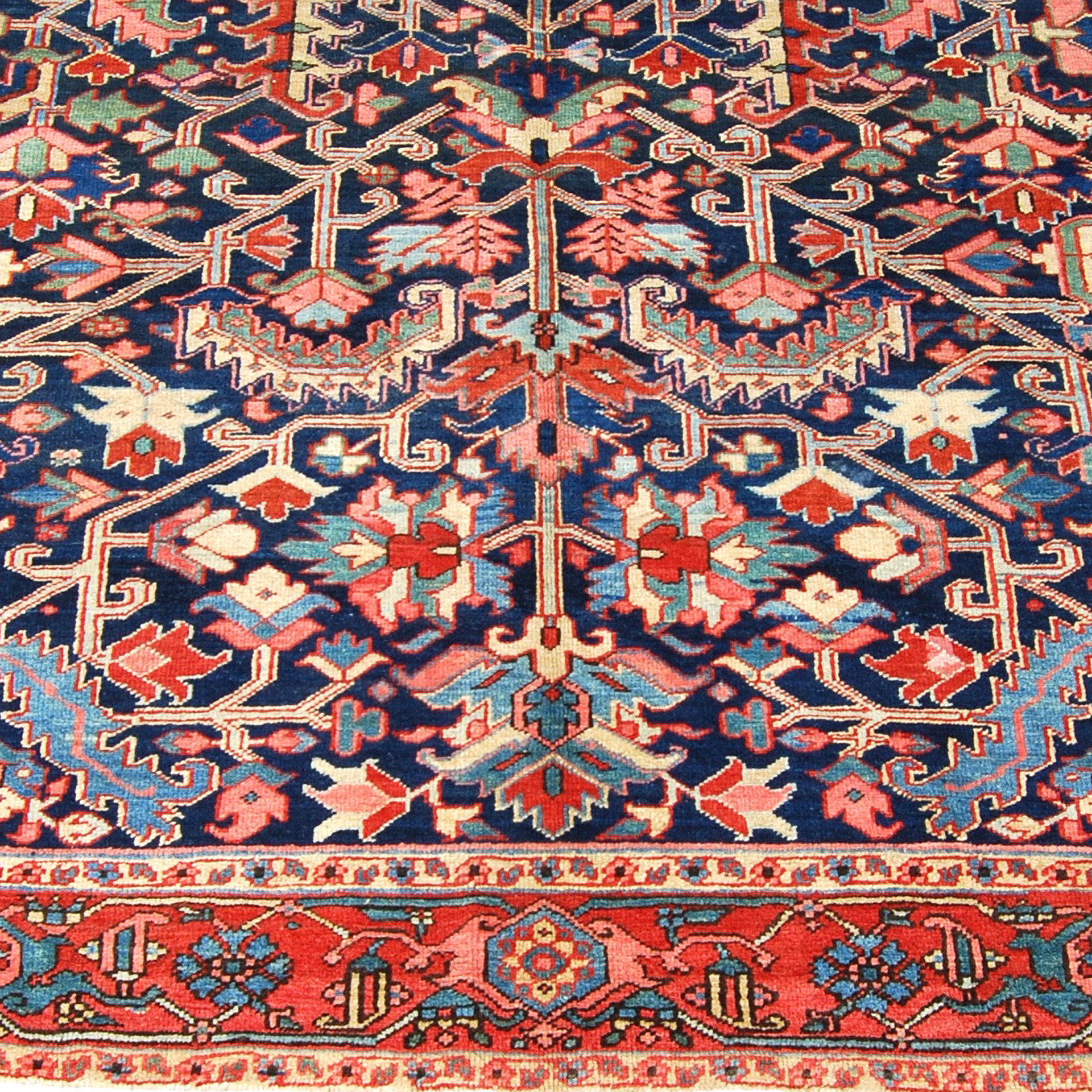 Detail of antique Persian Heriz carpet with a navy field and all-over design, circa 1920
