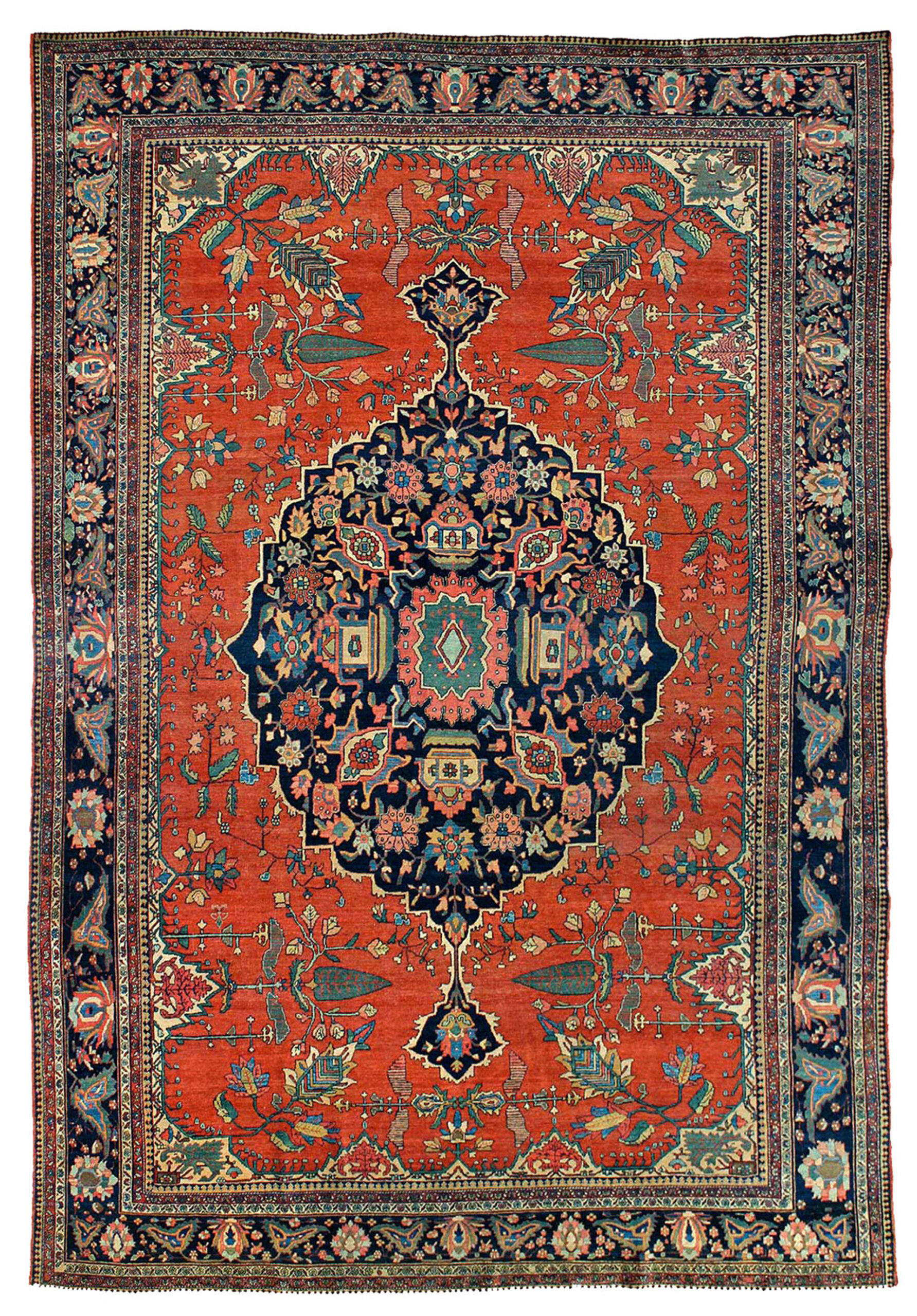 Antique Fereghan Sarouk carpet with a central medallion and Cypress Trees on a brick red field