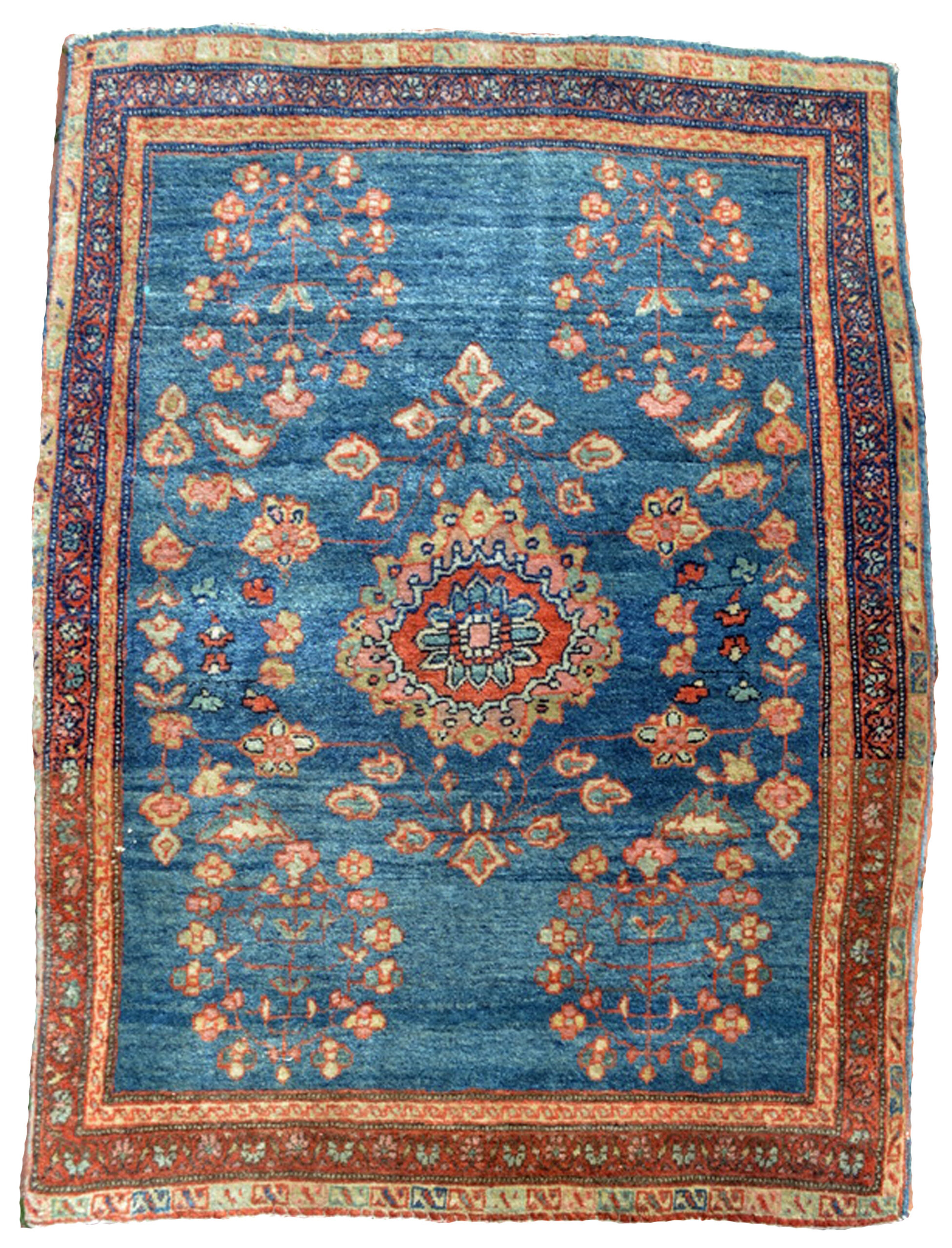 A small antique Persian Fereghan Sarouk rug with a floral design on a denim blue field, circa 1900 - Douglas Stock Gallery, antique Persian rugs, Boston,MA area, New England antique rugs