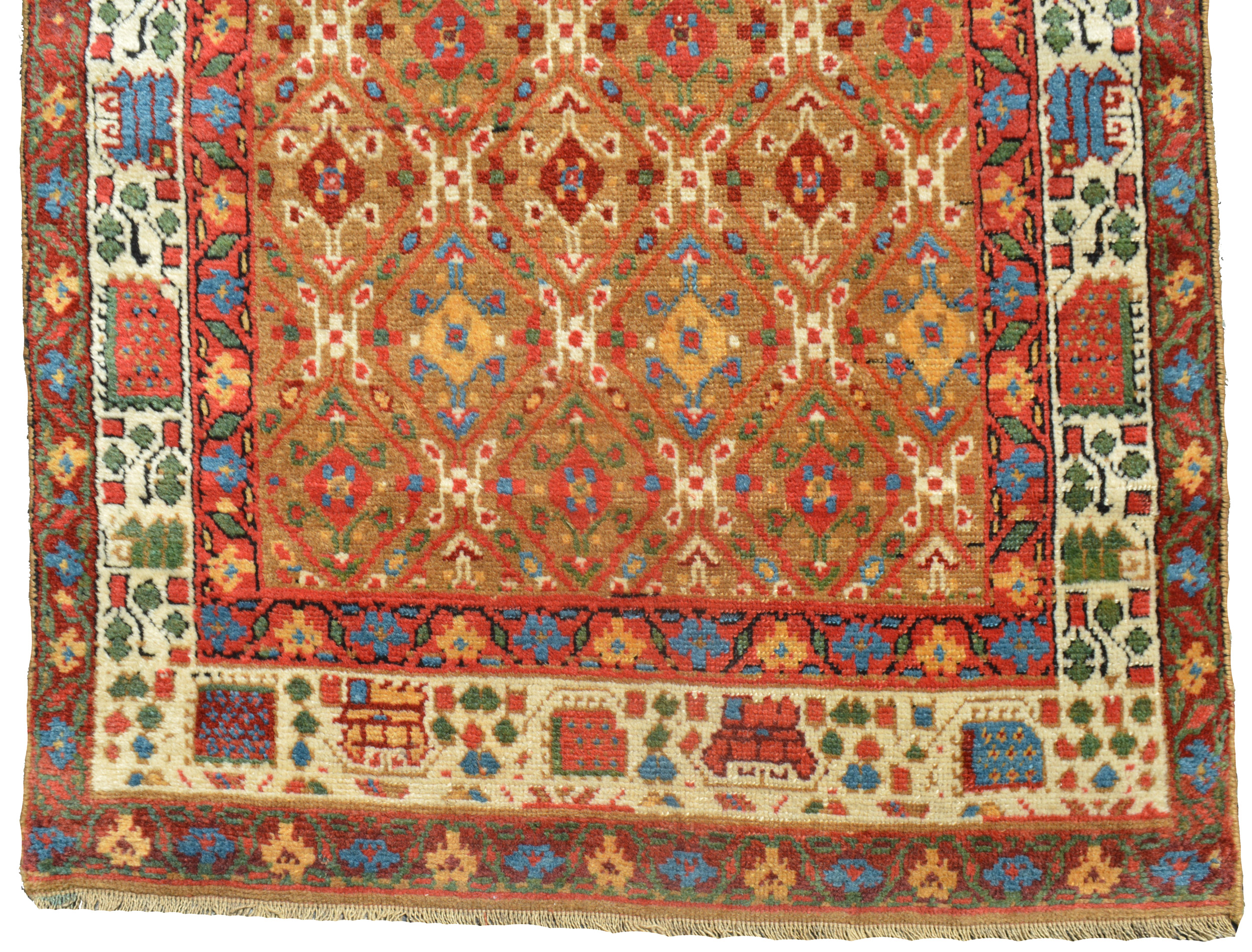 Detail of an antique northwest Persian runner rug with a camel color field decorated with geometric motifs and framed by an ivory border, circa 1875 - Douglas Stock Gallery antique Oriental rugs, Boston,MA area, New England, 19th century Persian rugs