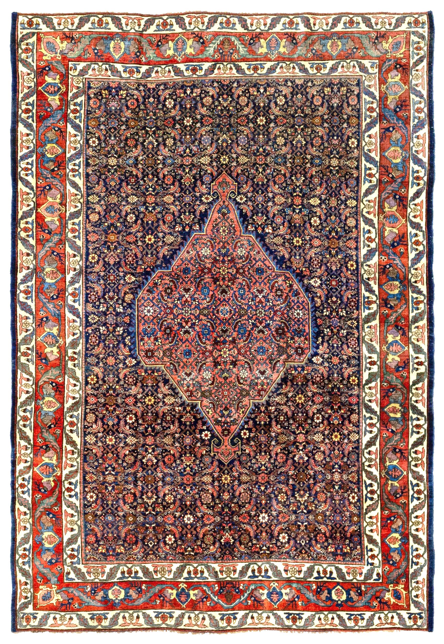 An antique northwest Persian Bidjar carpet from Kurdistan province, circa 1895. The navy blue, "Herati" design field contains a light rose color medallion and is framed by a brick red border with the famous "deer head" design and ivory guard borders. Douglas Stock Gallery is a nationally regarded dealer in antique Oriental rugs that specializes in antique Bidjar rugs and Bidjar carpets.