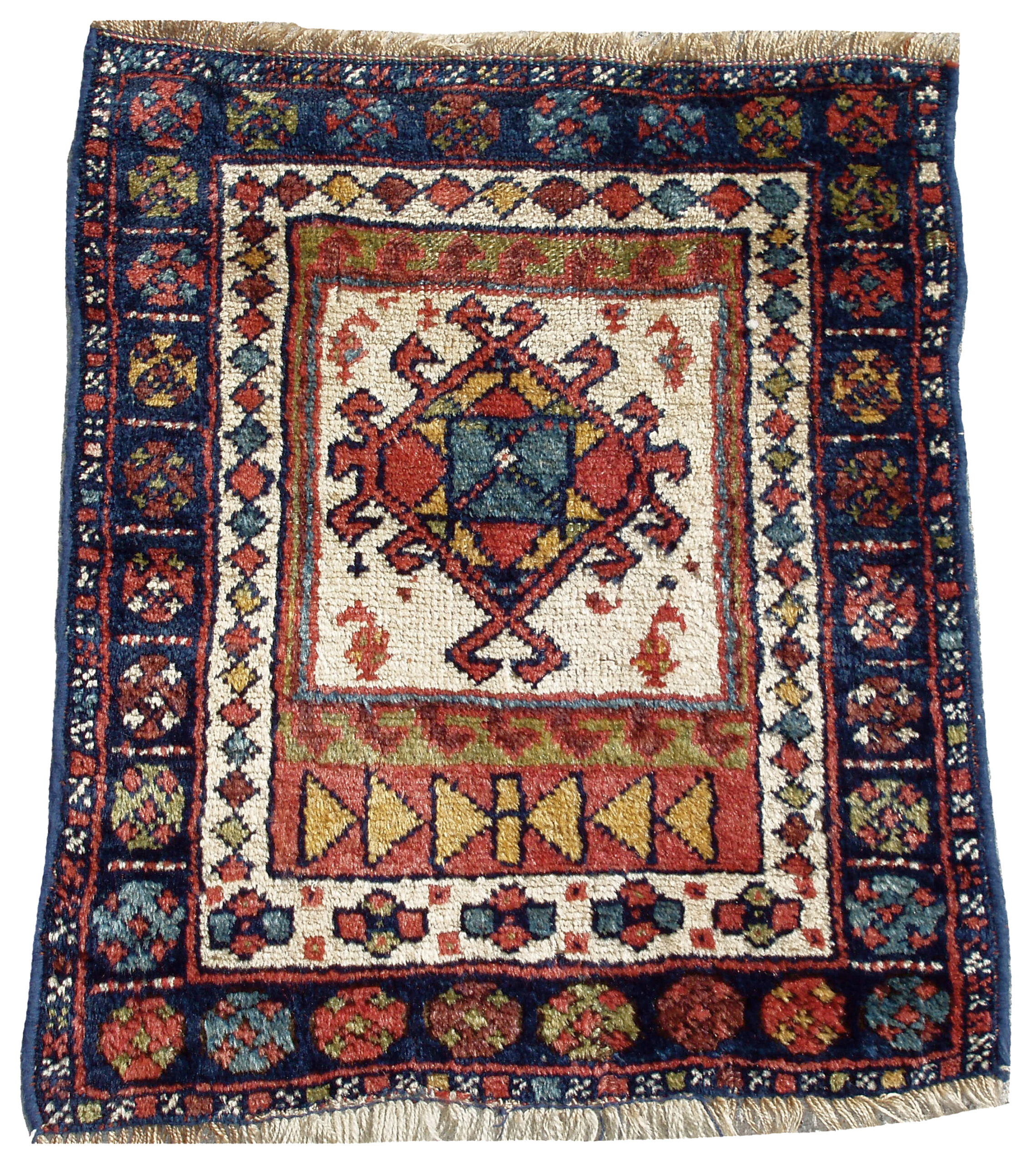 An antique northwest Persian Kurdish bagface with an ivory field, circa 1900 - Douglas Stock Gallery antique Oriental rug research archives
