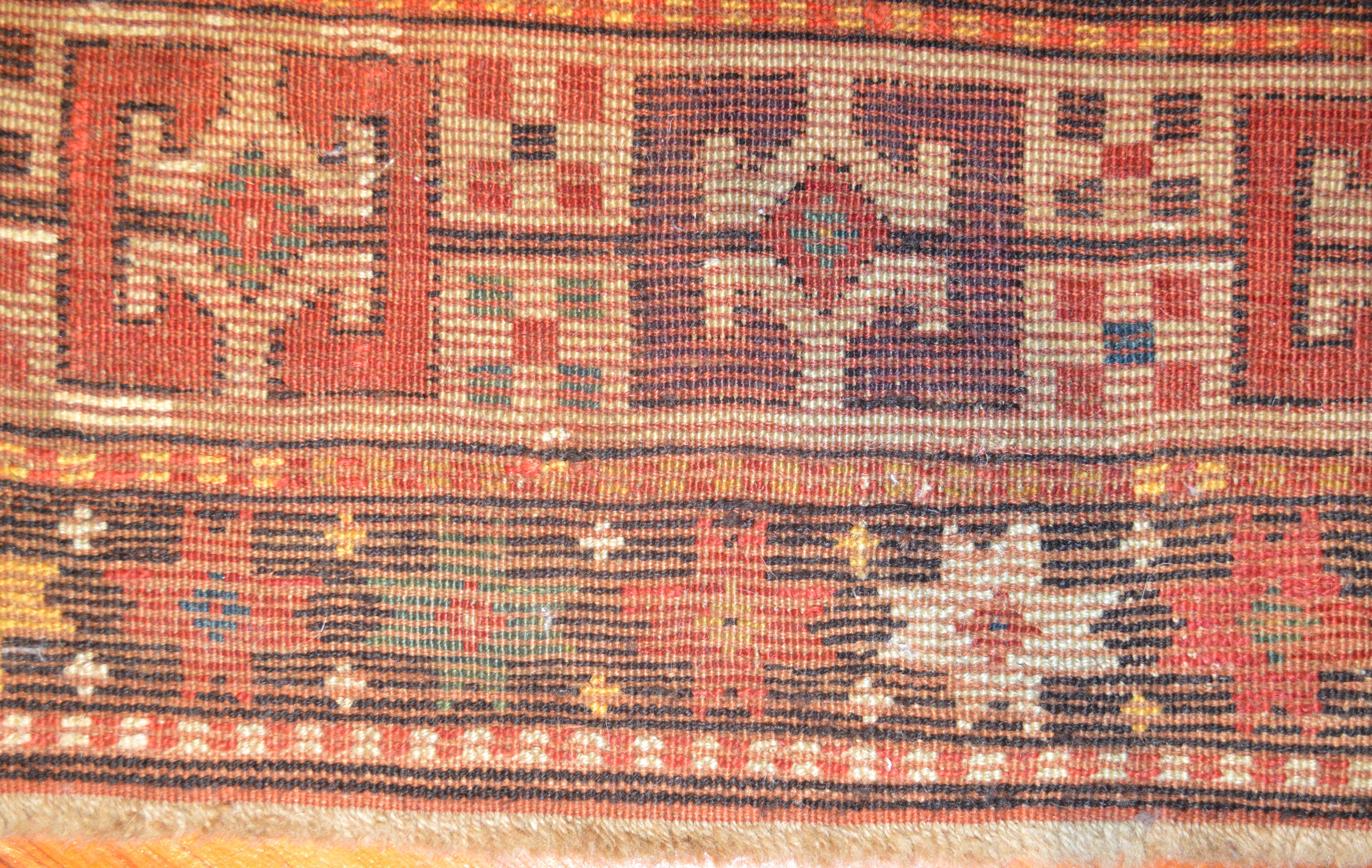 Rewoven and/or repiled areas in an antique Caucasian Karachoph Kazak rug