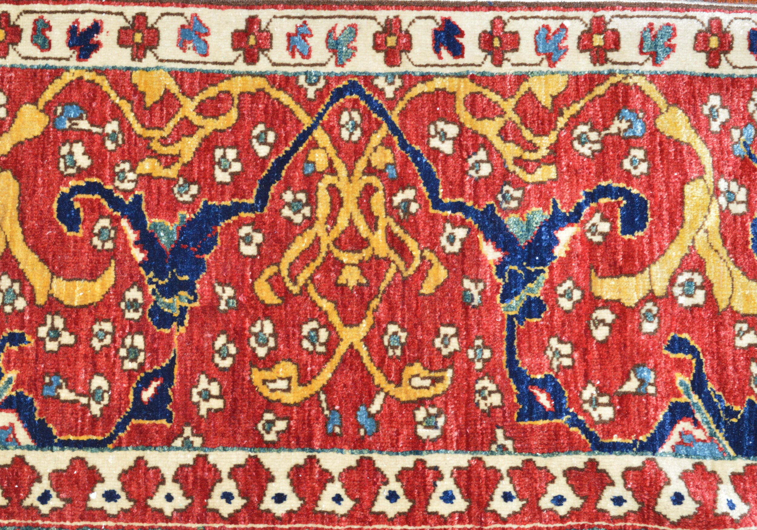 Detail of a red major border with a Reciprocal Trefoil minor border from a new, hand woven Arabesque design carpet from Azerbaijan - Douglas Stock Gallery, contemporary natural dye Oriental rugs Boston,Ma area South Natick,MA Oriental rugs