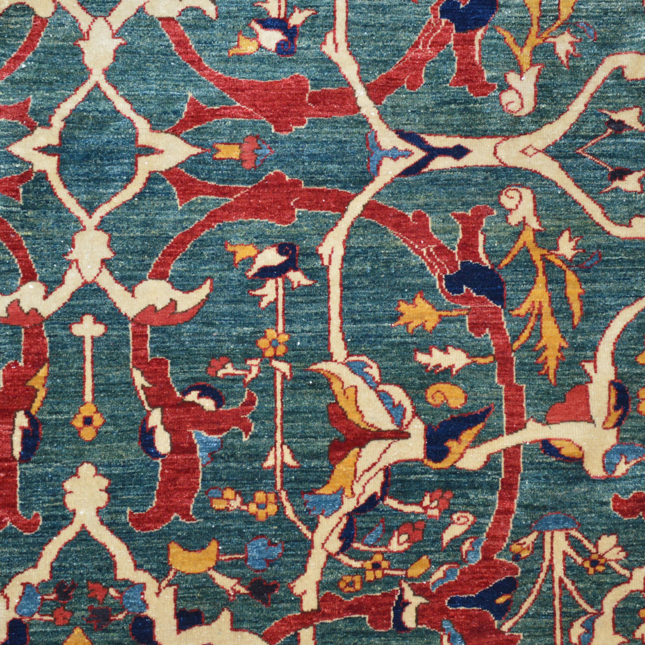 Field detail from a finely woven, new Azerbaijan carpet with an Arabesque design on a green field. Douglas Stock Gallery, antique and new Oriental rugs Boston,MA area New England