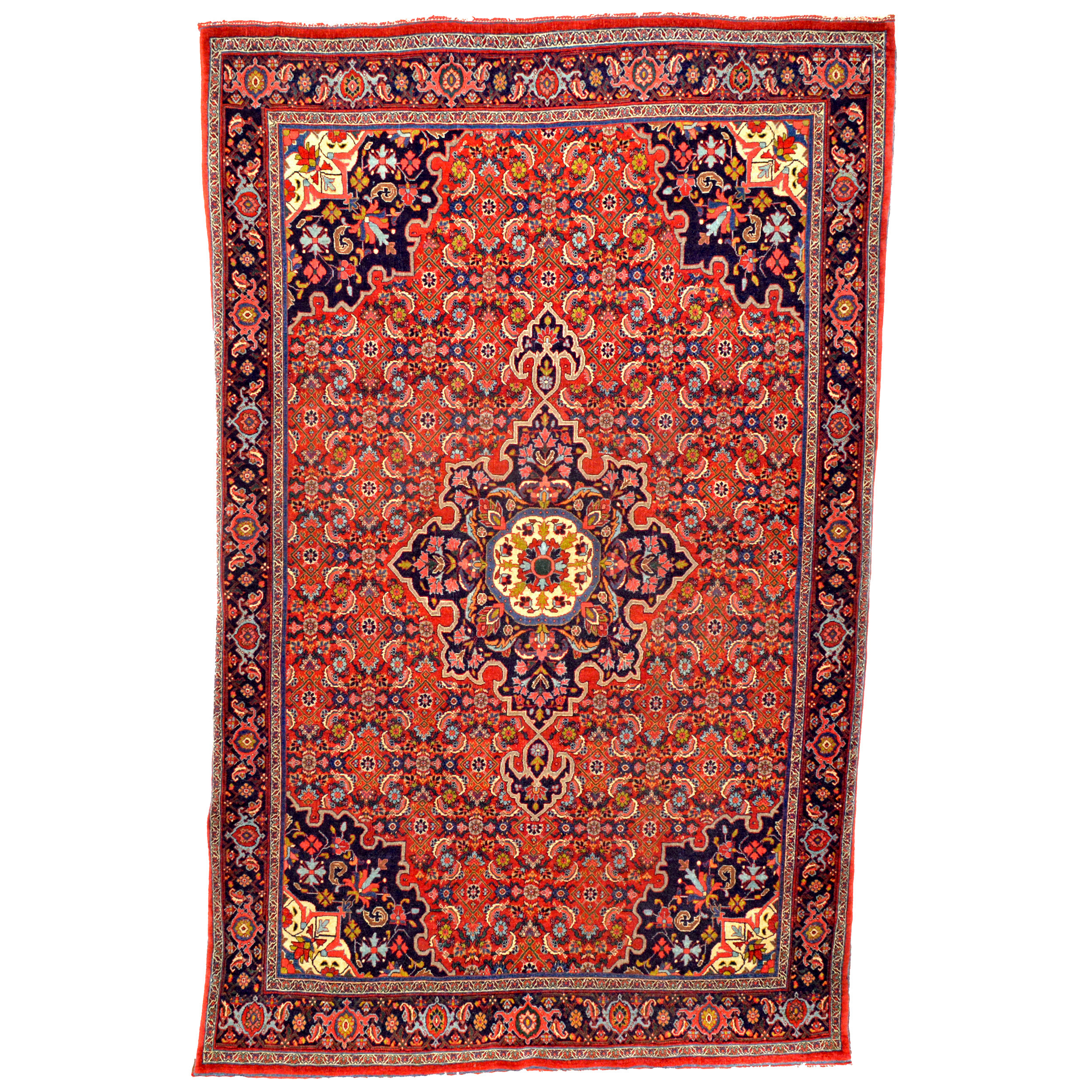A fine antique Persian Halvai Bidjar rug. The red field is decorated with the classical Herati design with a navy medallion and border - Douglas Stock Gallery, antique rugs Boston area, antique Persian rugs New England