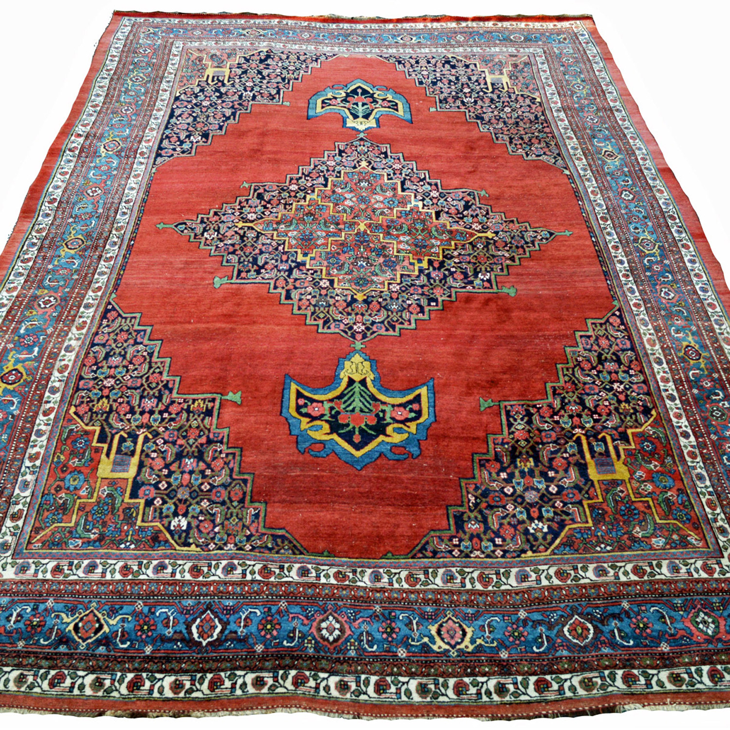 An antique Persian Bidjar carpet with a red open field decorated with a navy medallion and framed by navy, Herati design spandrels and a deep sky blue Turtle design border, northwest Persia, Kurdistan province, circa 1890 - Douglas Stock Gallery, antique Persian carpets Boston,MA area, antique riugs South Natick / Wellesley area, Oriental rugs New England