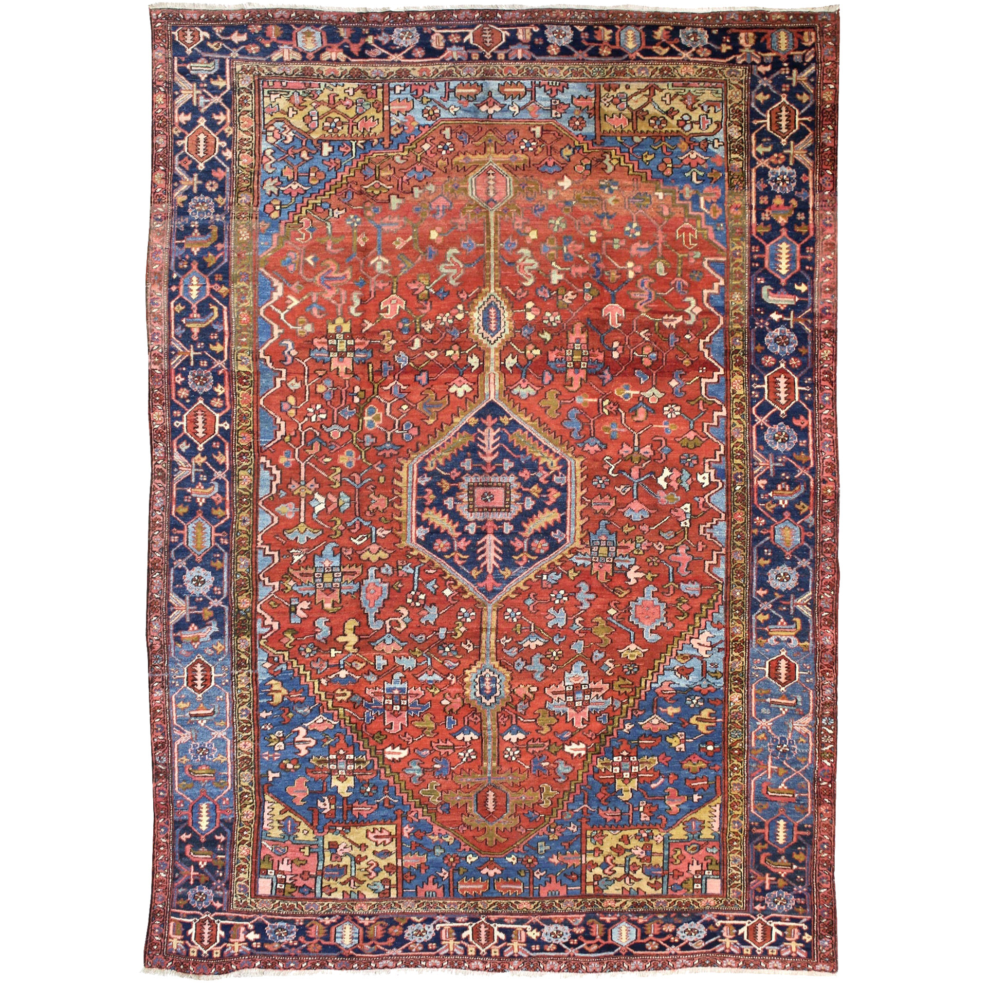 Antique Persian Heriz carpet with a small, navy blue medallion on a terra cotta color field, circa 1920, Douglas Stock Gallery, antique Oriental rugs Boston,MA area, antique carpets New England