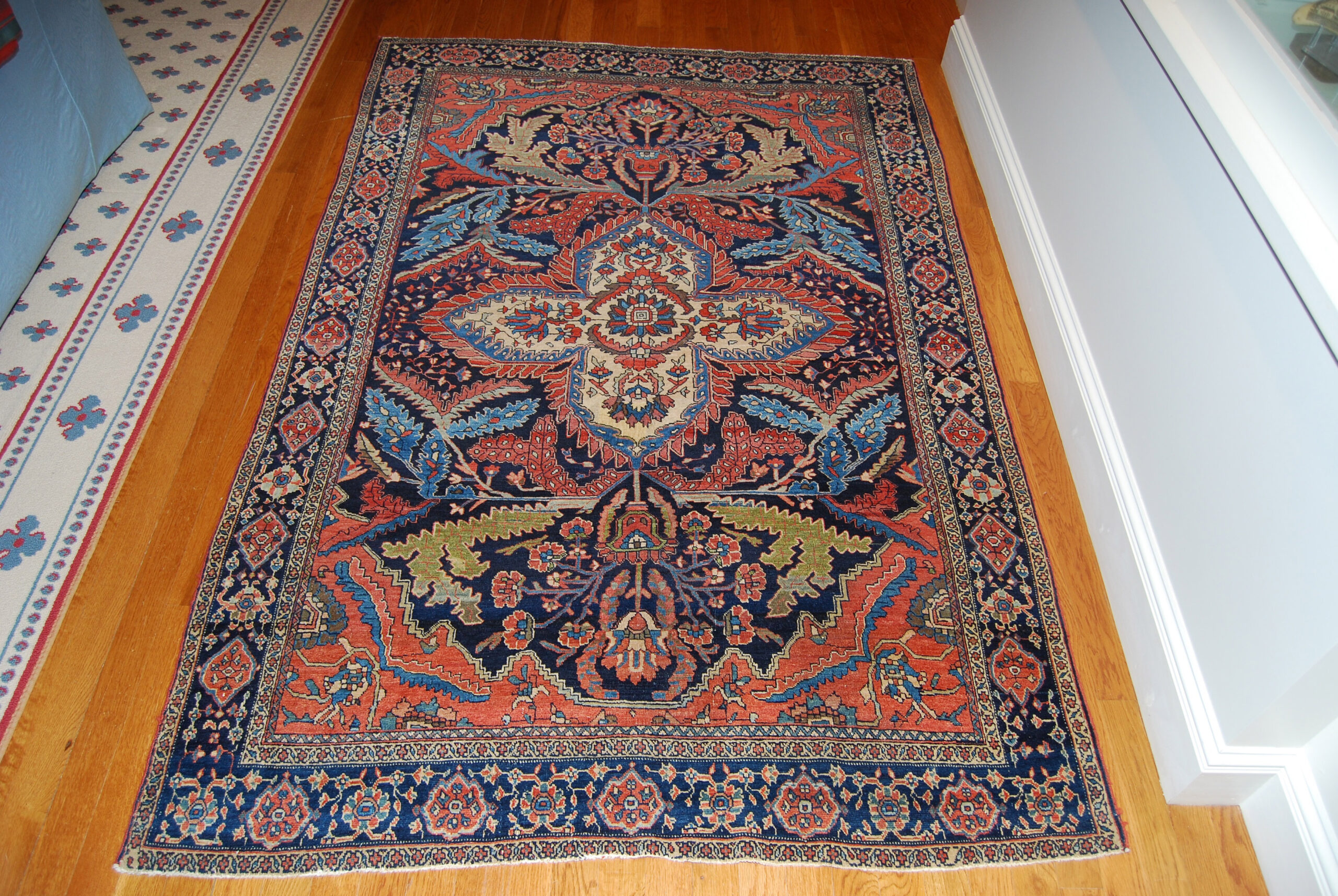 19th century central Persian Fereghan Sarouk rug displayed in the living room of a New England family home, Douglas Stock Gallery, antique rugs Boston,MA area