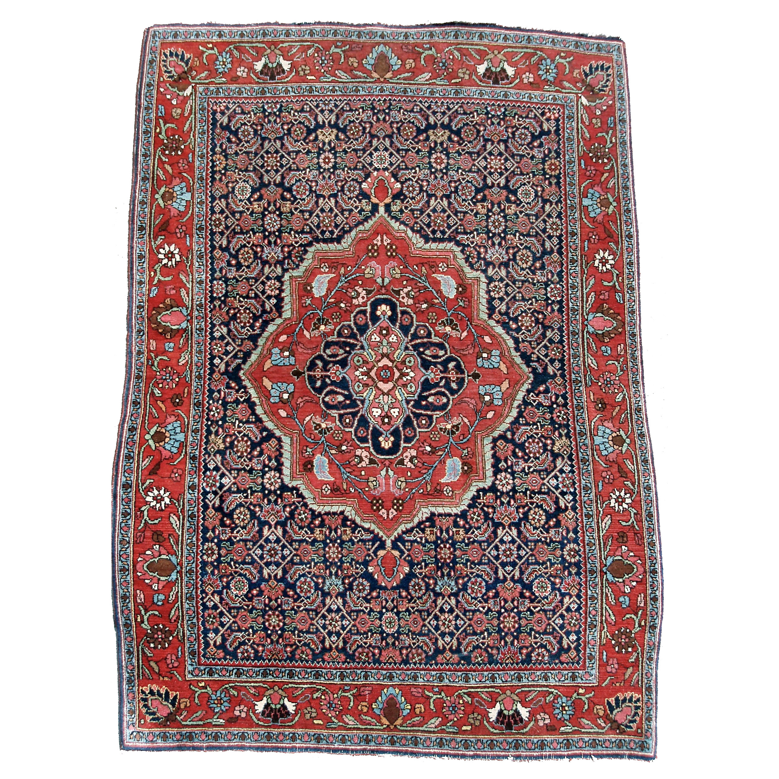 Antique Persian Bidjar rug with a terra cotta color medallion on a navy blue field that is decorated with the classical Herati design, Douglas Stock Gallery Antique Oriental Rug Research Archives, antique rugs Boston,MA area