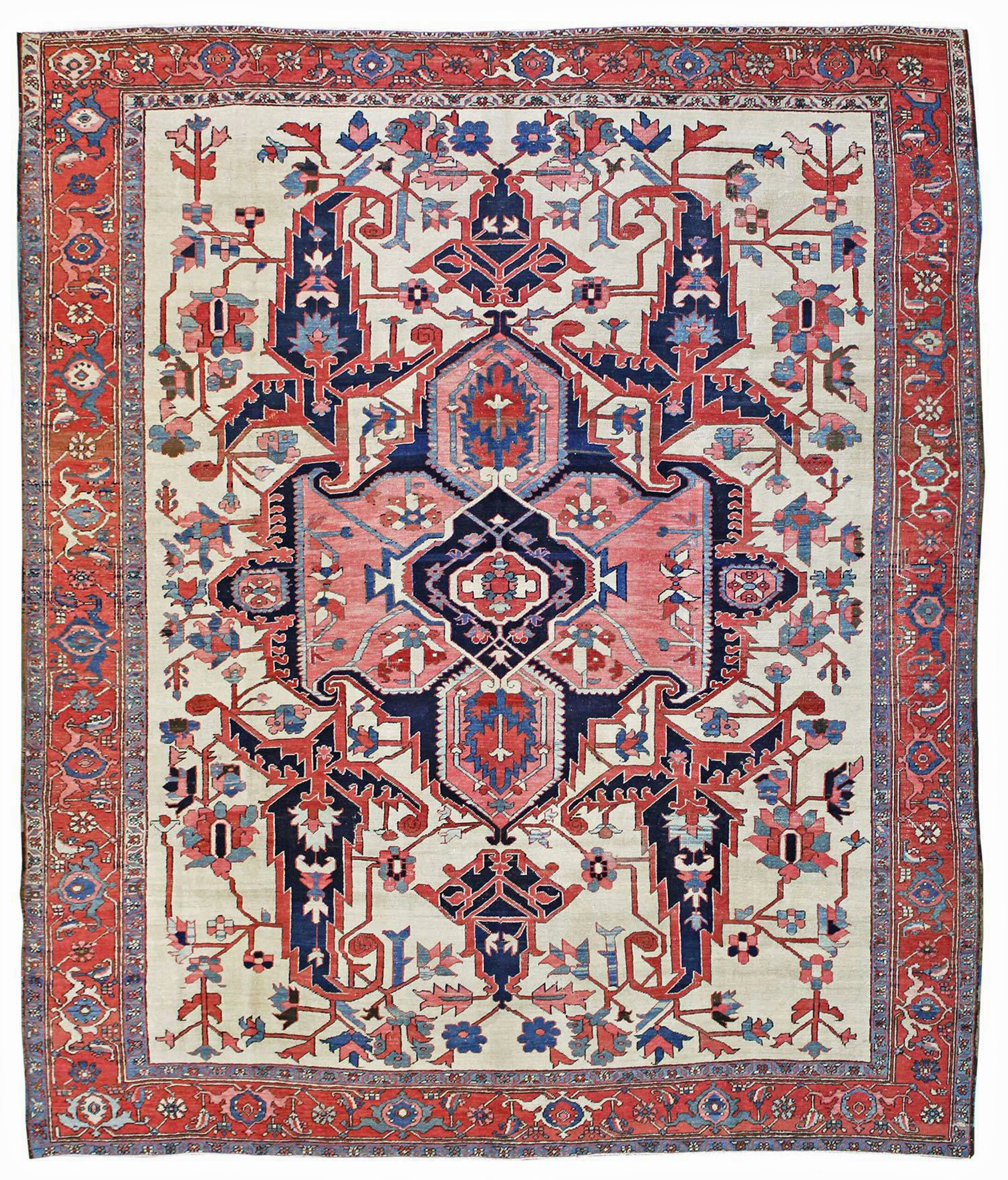 Antique carpets from the Heriz district in northwest Persia, primarily those predating circa 900, are often referred to colloquially as antique "Serapi" carpets. This outstanding example features a navy blue and coral medallion on an ivory field that is also decorated with four large, navy blue leaves and ancillary stylized floral decoration including polychromatic flowers. The format is somewhat uncommon, where there are no corner spandrels, typically a concomitant feature of medallion carpets, and the ivory field instead extends bot vertically and horizontally to where the border system begins. Douglas Stock Gallery is one of America's most selective dealers in antique Persian carpets. Owned by Helen and Douglas Stock, the gallery is located in historic South Natick, Massachusetts, 15 miles west of Boston and 5 minutes from Wellesley center. Open by appointment only Monday through Saturday, Douglas Stock Gallery is convenient to Boston area towns including Brookline, Newton, Belmont, Weston, Wellesley, Needham and Natick and offers a range of antique Persian carpets including Heriz, Serapi, Bakshaish, Fereghan, Sarouk, Kashan, Bidjar, Sultanabad and Tabriz, plus antique tribal rugs from Persia and the Caucasus.