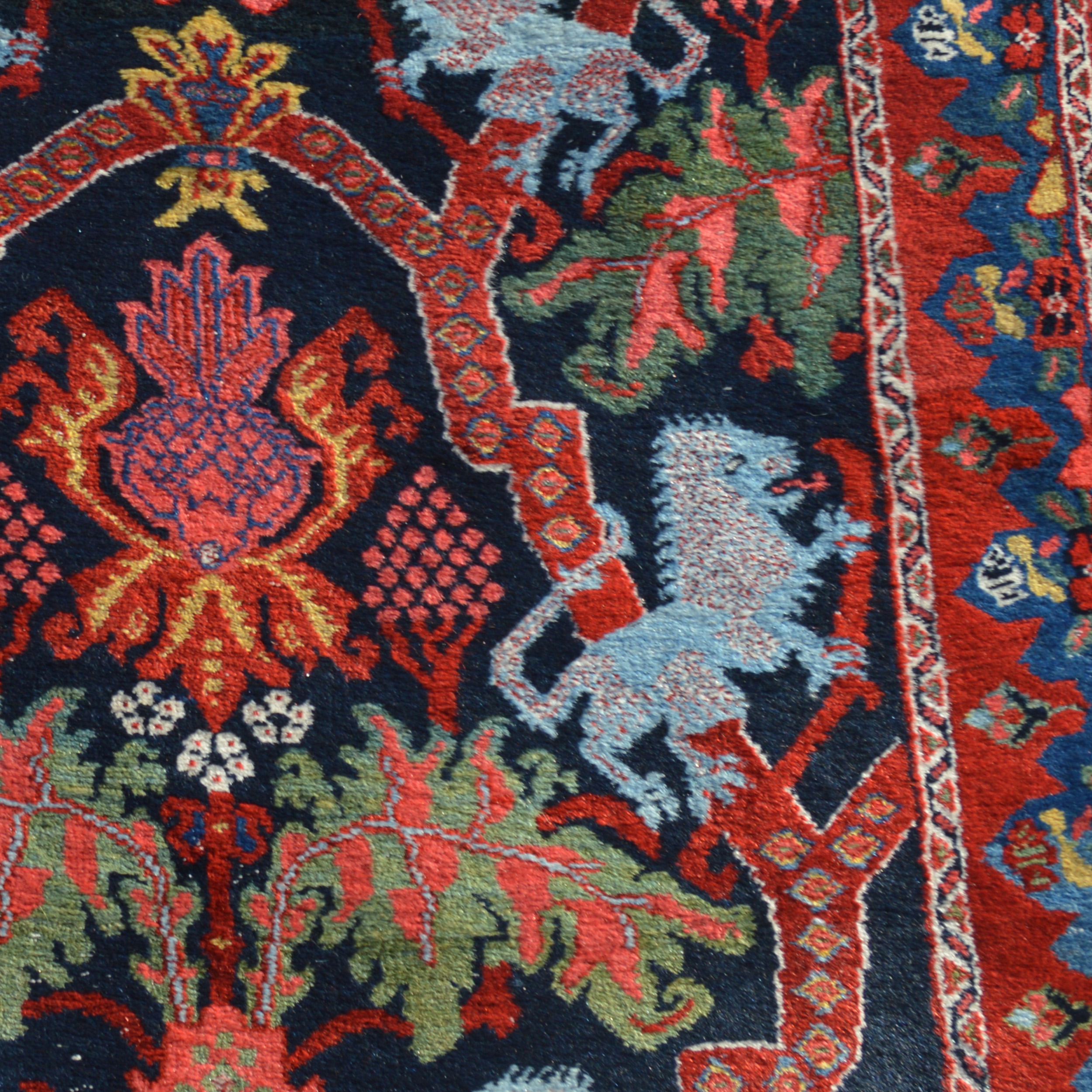 Detail of Lions, strapwork, leaves and floral forms in a very rare antique Persian Bidjar Lion rug runner, Douglas Stock Gallery , antique Persian rugs Brookline, Newton, Weston, Wellesley, Needham, Dover, Sherborn, Natick,MA area