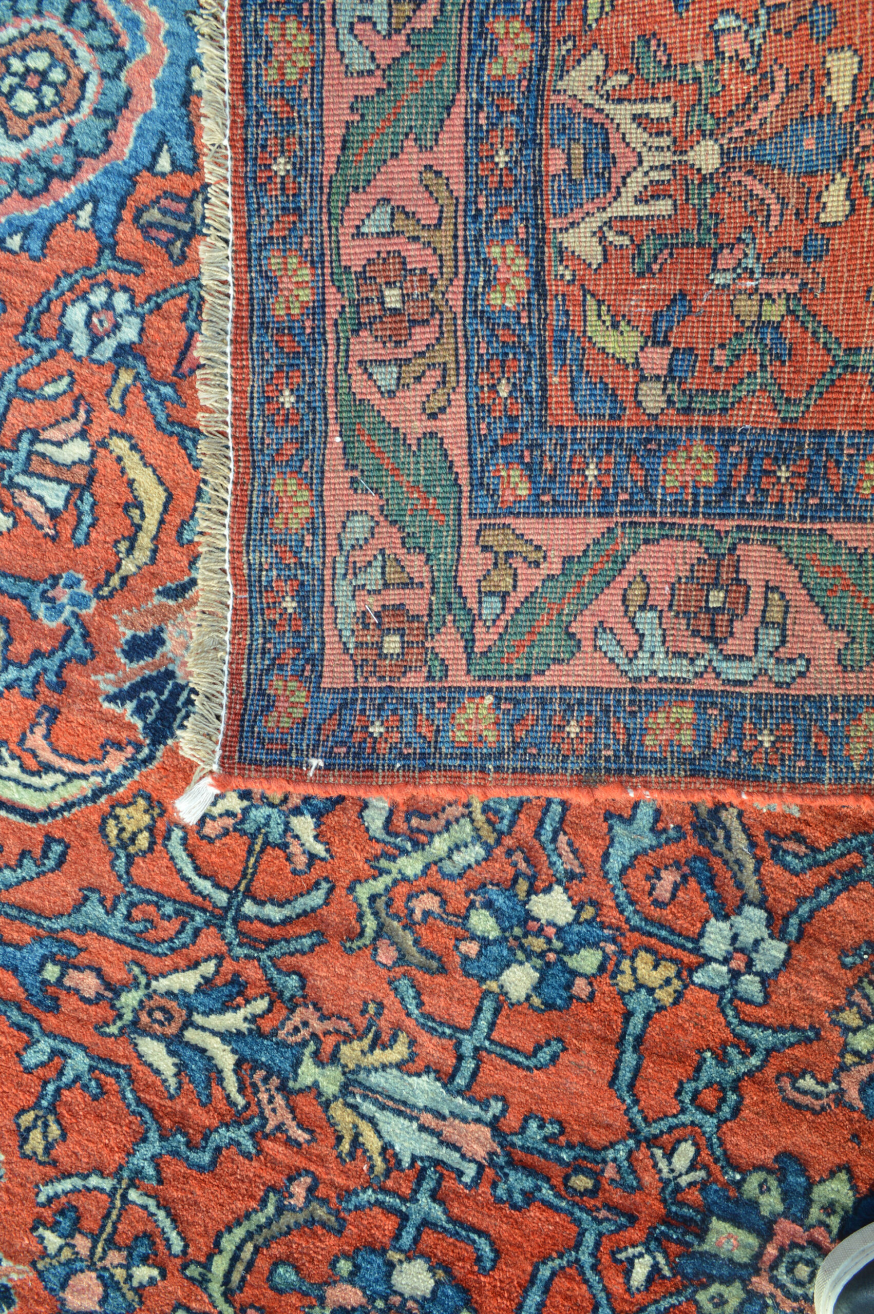 Weave detail from an antique Persian Bidjar runner rug with a coral and green border framing a salmon color field, Douglas Stock Gallery, antique Persian rugs, antique Persian runners, antique Persian carpets