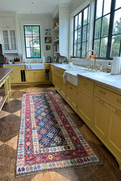 Douglas Stock Gallery, antique Oriental rugs in room settings, an antique Turkish runner in the kitchen of a California family home