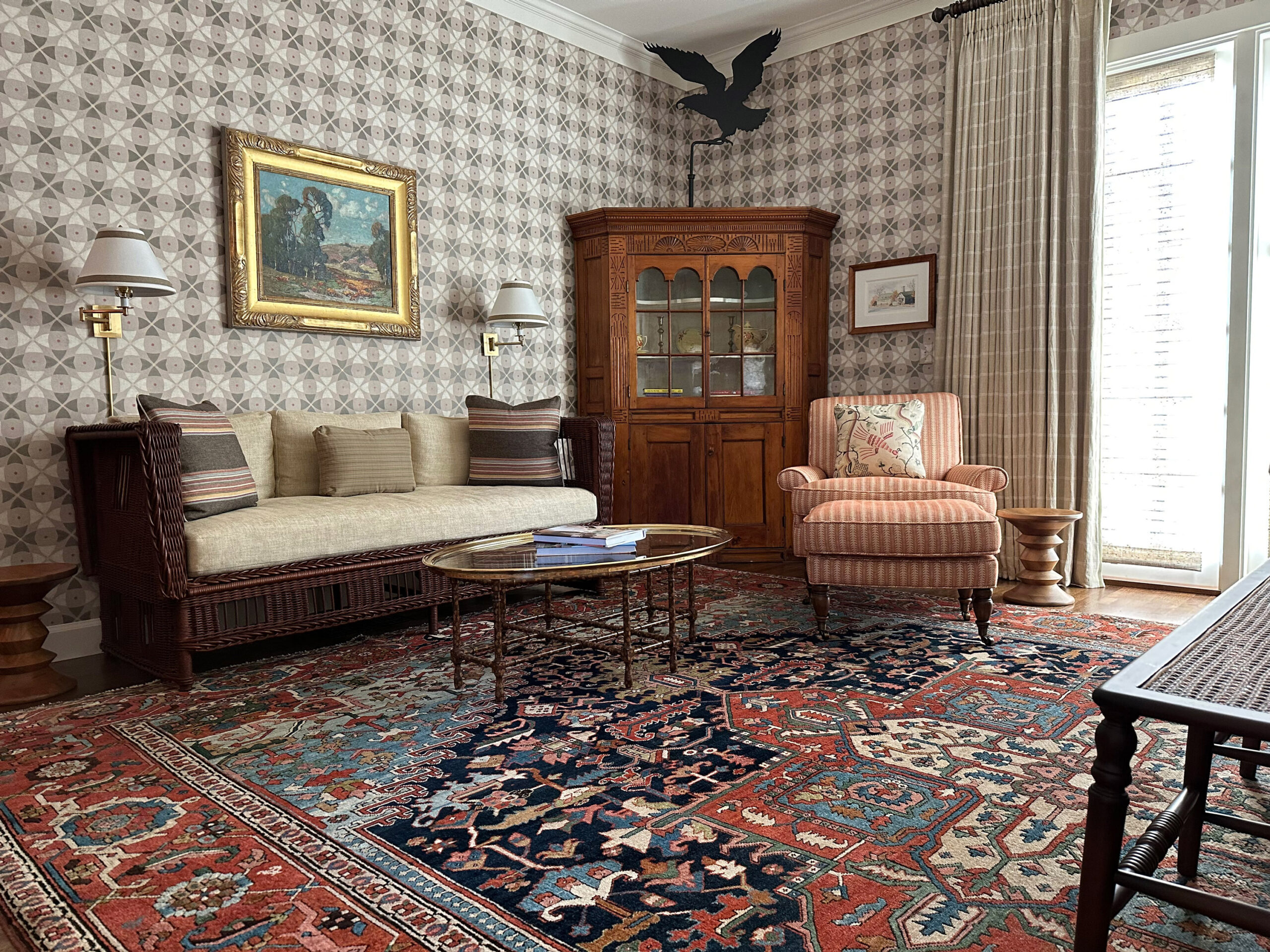 An antique Persian Heriz carpet in the living room of a California family home - Douglas Stock Gallery