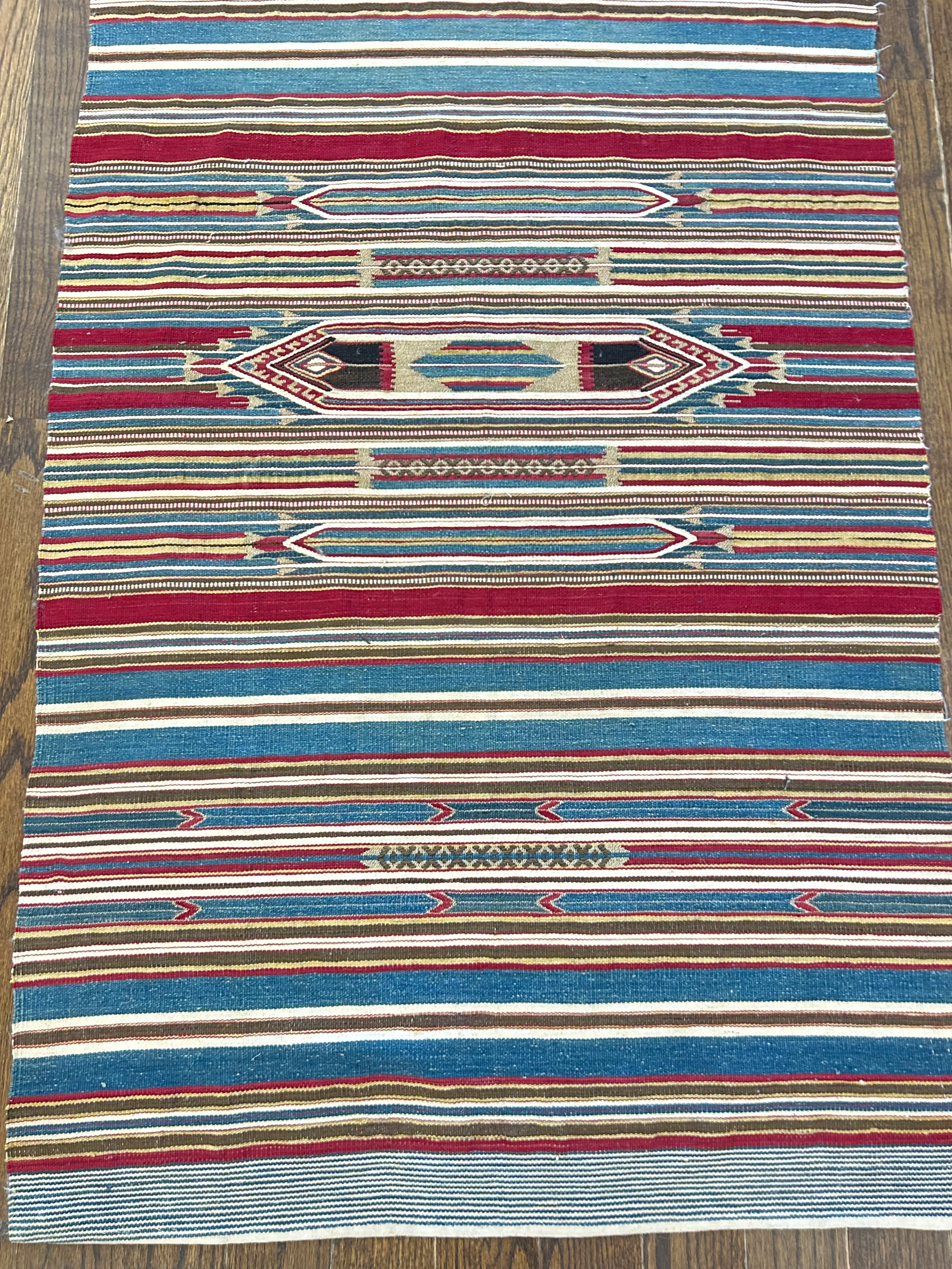 Antique Armenian kilim probably woven in Syria after the Turkish Armenian Genocide which took place in Turkey circa 1915-1916. The magnificent kilim runner rug was woven using wool with silk and metal thread highlights, probably in the 1920s.