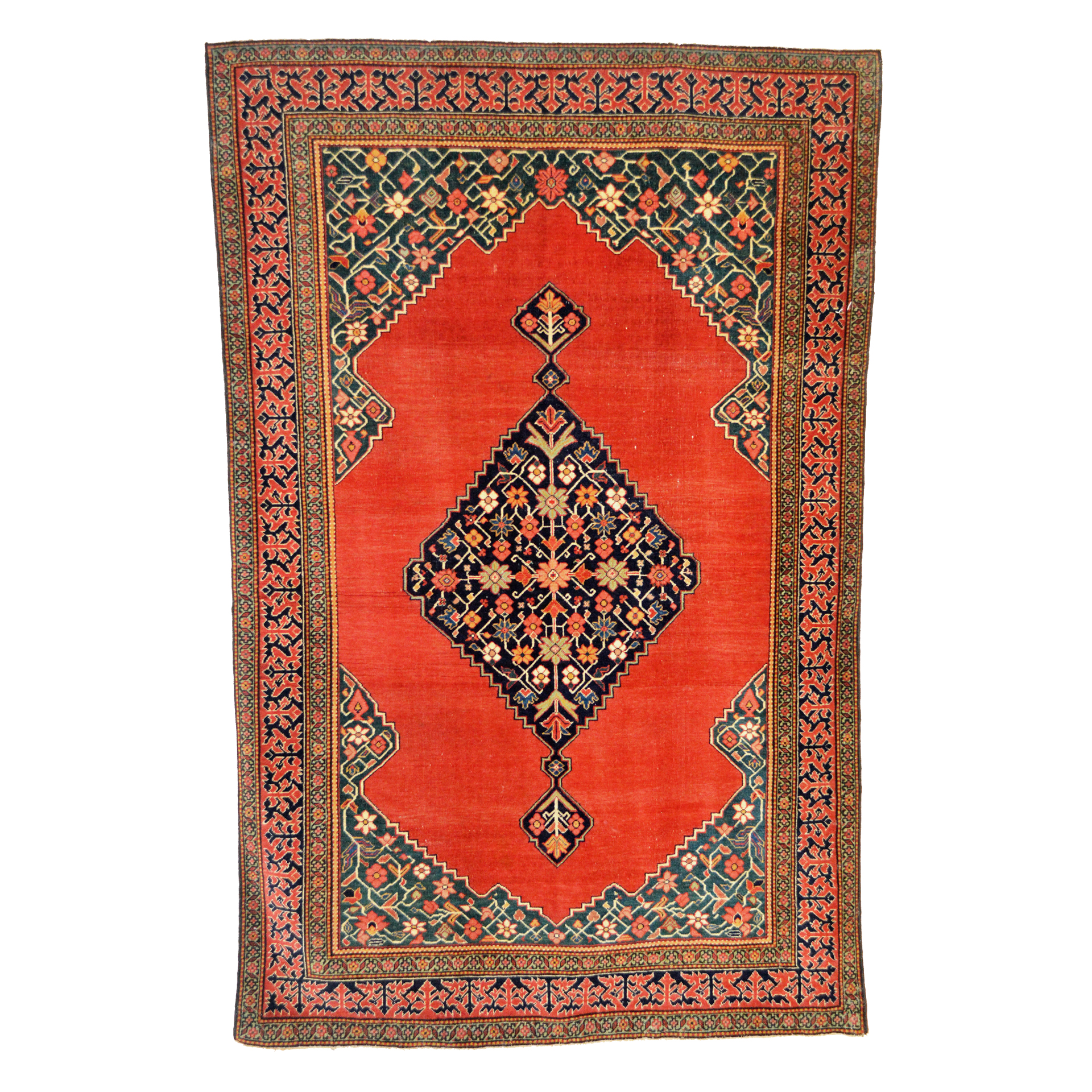 A late 19th century Fereghan rug from central Persia's Sultanabad province. The red open field contains a navy blue medallion and is framed by uncommon deep green corner spandrels. Douglas Stock Gallery is a Boston,MA area dealer specializing in highly select antique Oriental rugs, with particular emphasis on antique Fereghan rugs, antique Fereghan Sarouk rugs, antique Mohtasham Kashan rugs, antique Heriz "Serapi" rugs and antique Bidjar rugs. Antique rugs Wellesley, Newton, Brookline, South Natick,MA area New England, antique Oriental rugs New York by appointment, antique Oriental rugs Washington,DC area by appointment