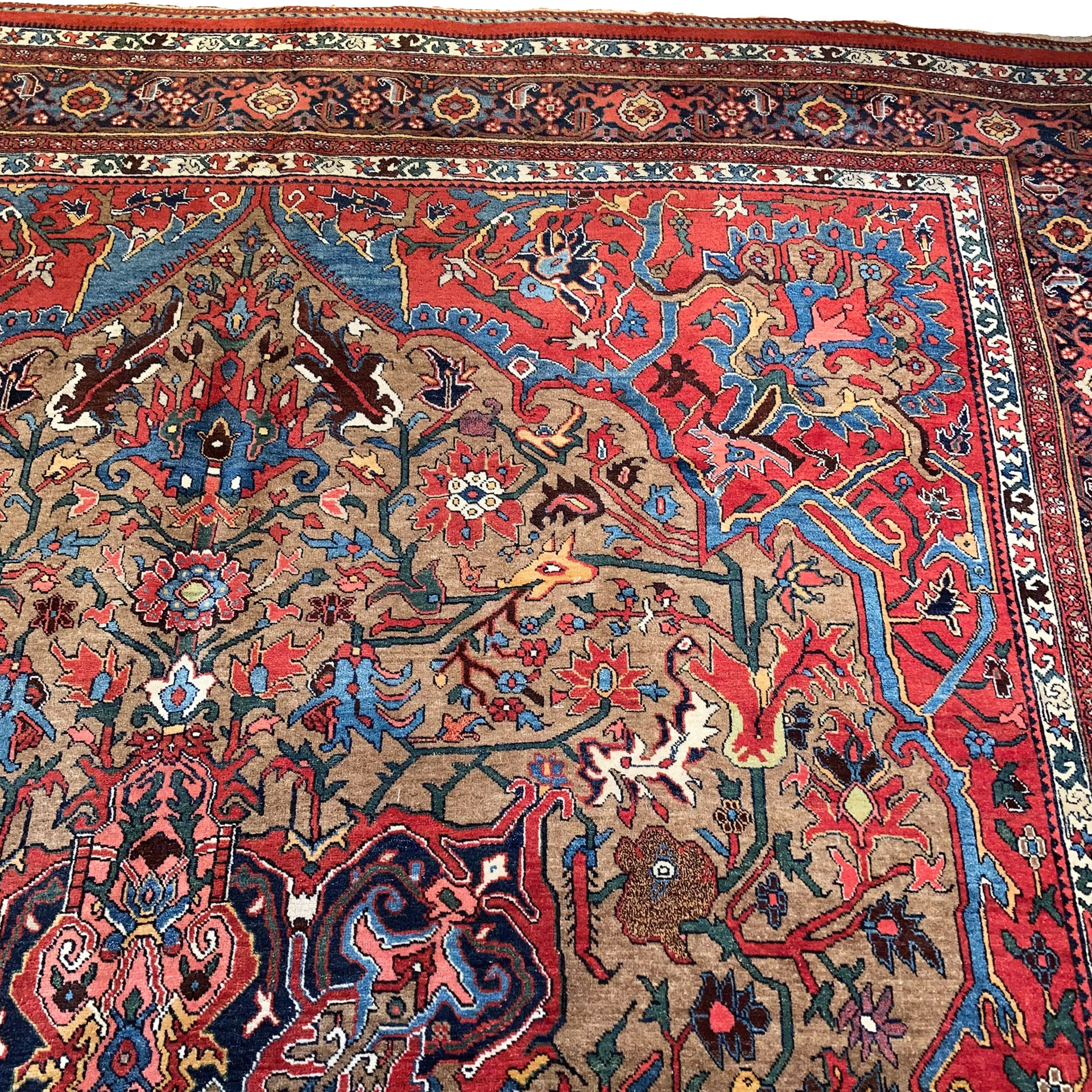 Antique Bidjar carpet with uncommon camel color field framed by a navy blue border, Douglas Stock Gallery, antique Oriental rugs, Persian carpets Boston,MA area, South Natick,MA