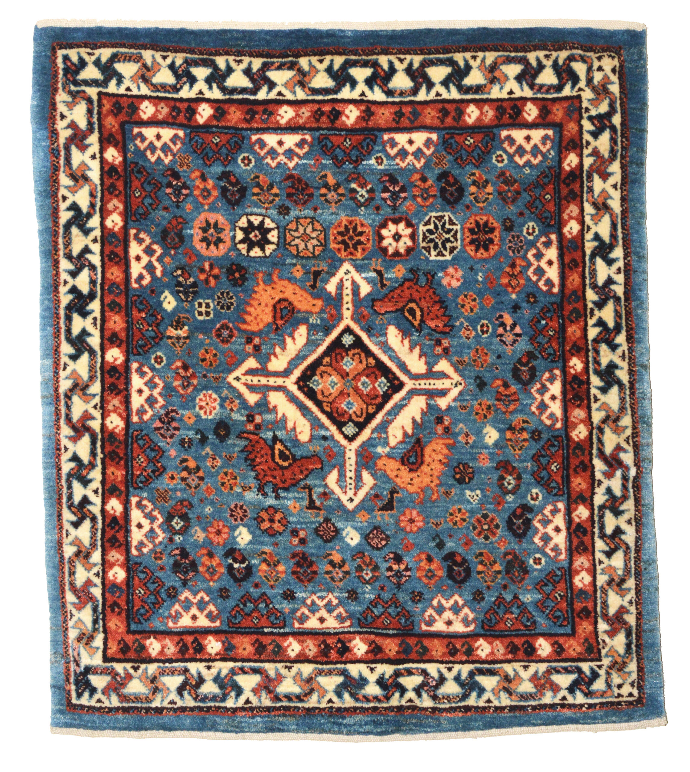 A new QashQa'i rug, hand woven utilizing natural dyes. The deep sky blue field is decorated with stylized birds, small animals, geometric motifs and Boteh (Paisley shaped motifs). Douglas Stock Gallery, new Oriental rugs Boston,MA area, Oriental rugs New England, Oriental rugs New York by appointment