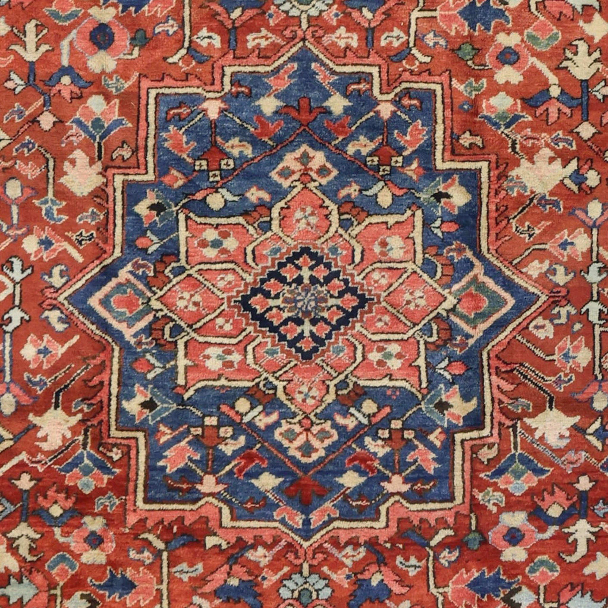 Denim blue and coral medallion detail from an antique Heriz carpet. Douglas Stock Gallery, antique Persian rugs Boston,MA area