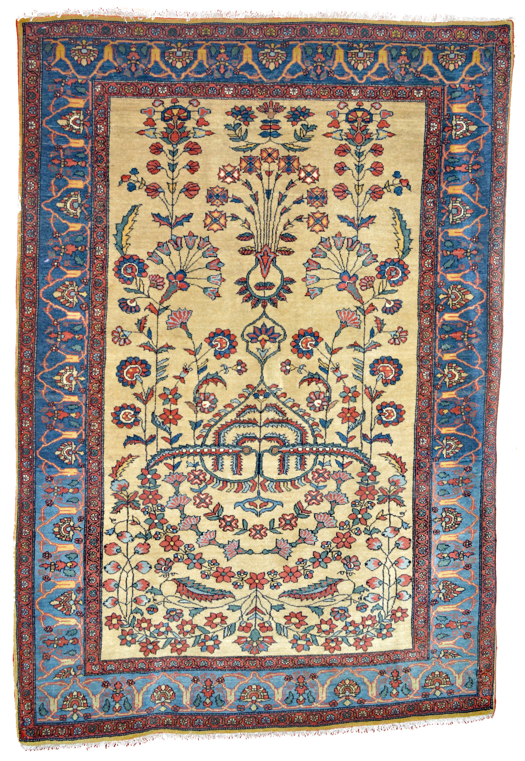 An antique Persian Fereghan Sarouk rug with well spaced floral forms on an ivory field that is framed by an abrashed sky blue to mid blue border, circa 1900 - Douglas Stock Gallery is one of America's most highly regarded dealers in antique Oriental rugs, shop located in the Boston,MA area in historic South Natick,MA New England, antique rugs New York by appointment, antique rugs Washington DC by appointment