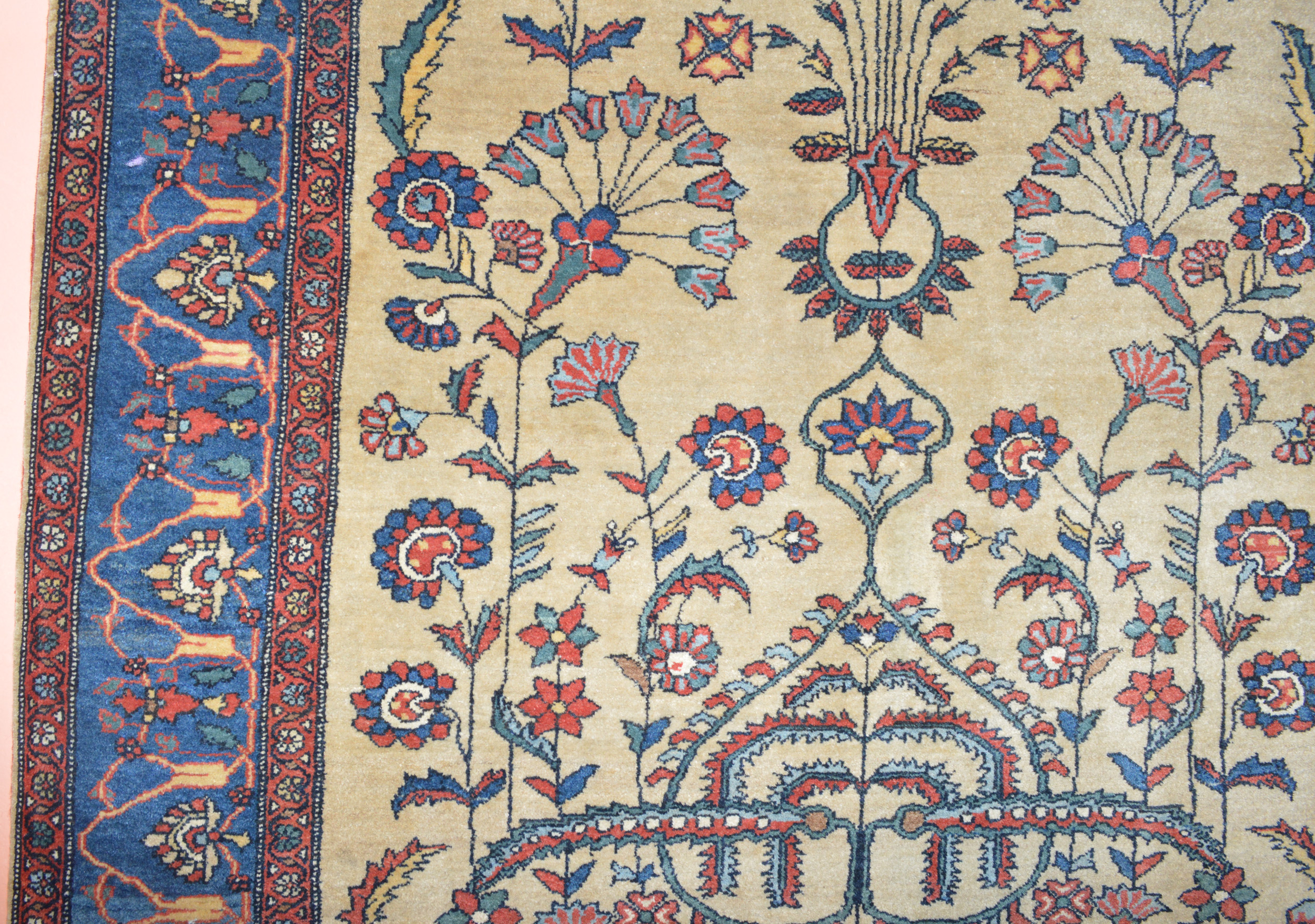Ivory, floral design field and blue border from an antique Persian Fereghan Sarouk rug, circa 1900 - Douglas Stock Gallery is one of America's most selective dealers in antique Oriental rugs, antique rugs Boston,MA area