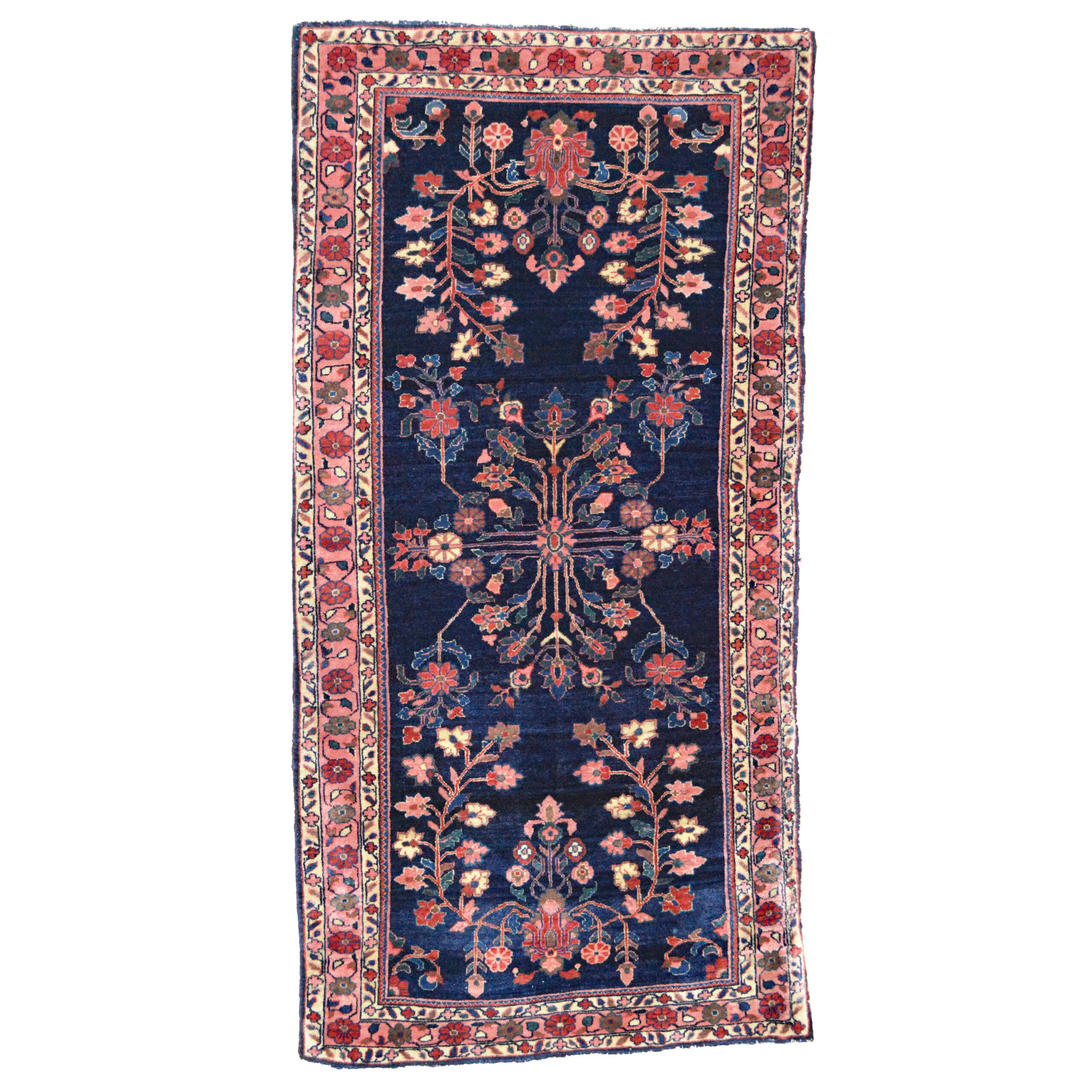 A finely woven antique Persian Mahajaran Sarouk rug. The navy field is decorated with stylized flowers and framed by a coral color border, circa 1915. Douglas Stock Gallery is a nationally regarded dealer in antique Oriental rugs based in the Boston area. Our shop in historic South Natick,MA is located 15 miles west of Boston and 5 minutes from Wellesley center. Douglas Stock Gallery is open by appointment Monday to Saturday. Antique Sarouk rugs Boston, NYC, Washington ,DC by appointment