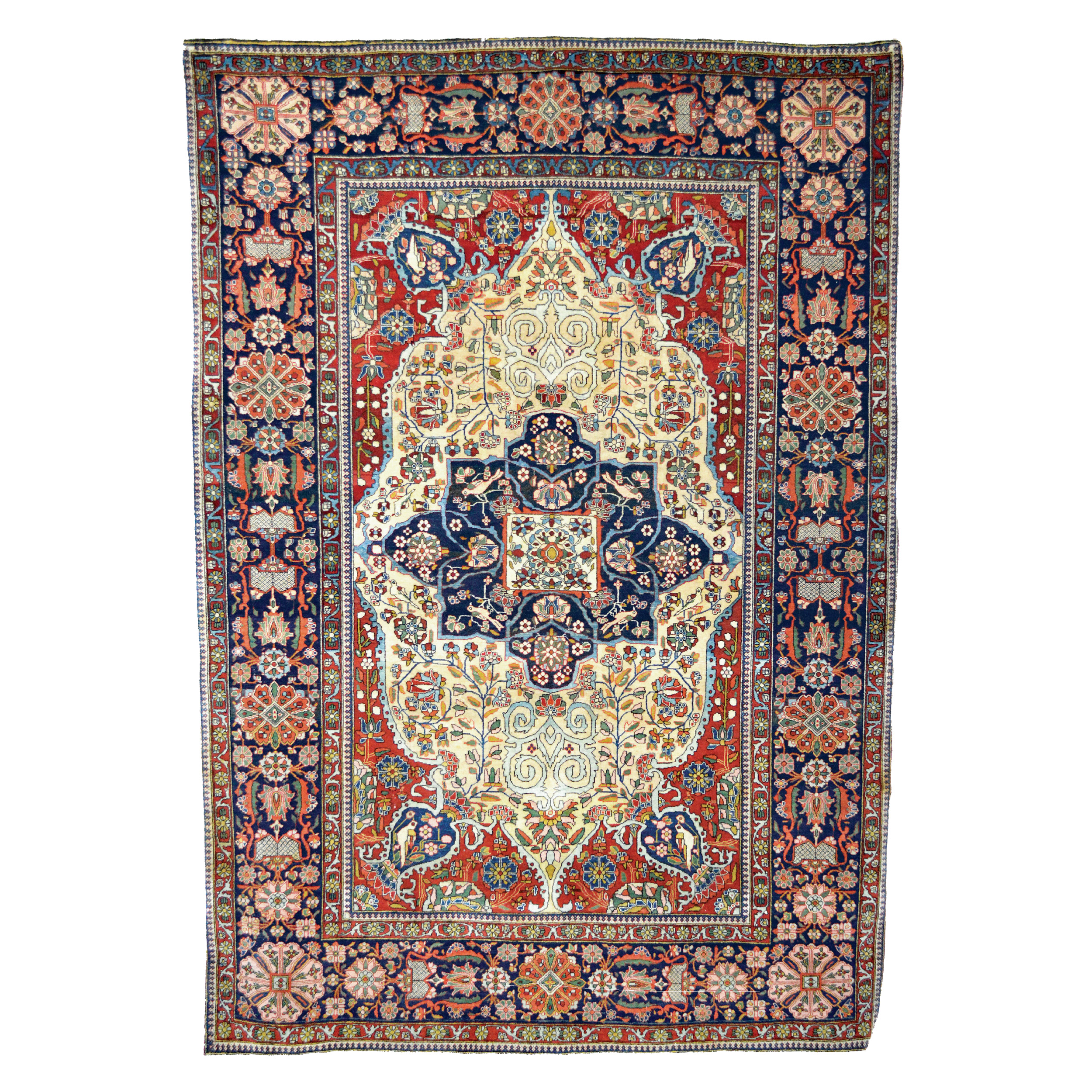 A late 19th century Persian Mohtasham Kashan rug. The ivory field is decorated with a navy blue medallion and stylized floral forms. Brick red corner spandrels contain vases and birds. A navy blue border of grand scale frames the field, central Persia, circa 1895 - Douglas Stock Gallery specializes in antique Persian Mohtasham Kashan rugs.