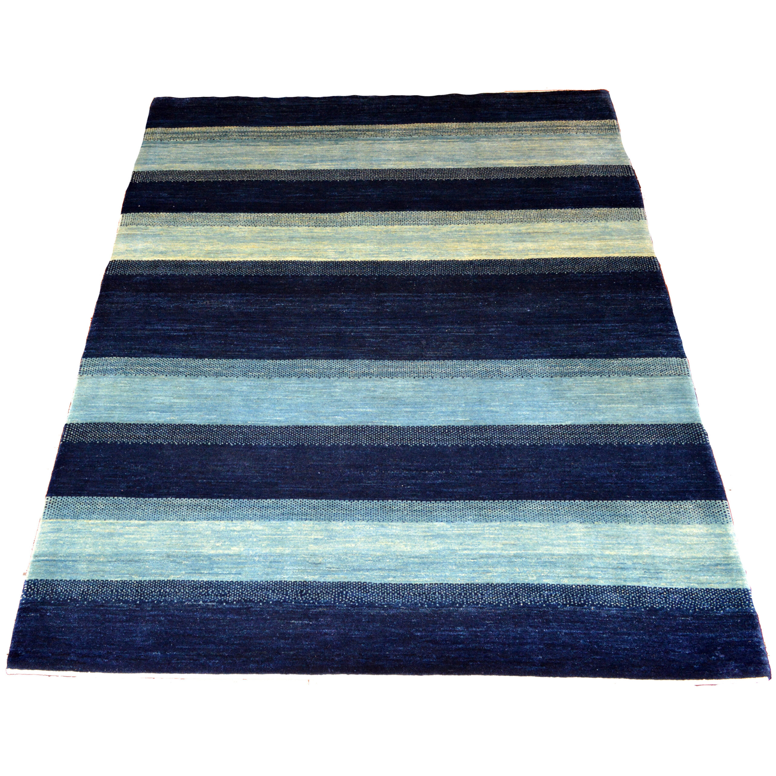 A modern hand woven Kashkuli rug featuring natural dyes with variegated blue horizontal stripes. This ru would be a great choice for a home near the ocean in Nantucket, Cape Cod, The Hamptons, Palm Beach Coastal New England or Los Angeles. Boston area rug specialists Helen and Douglas Stock of Douglas Stock Gallery offer a selection of contemporary hand woven Oriental rugs, plus a wide selection of antique rugs. Modern rugs Boston,MA area, Contemporary rugs Boston,MA area New England, contemporary rugs New York by appointment