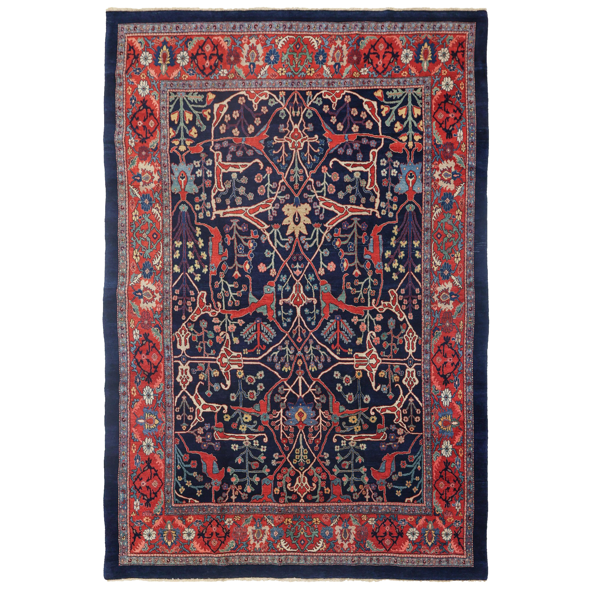 A finely woven contemporary Bidjar carpet, hand woven utilizing natural dyes and hand spun wool. The navy field is decorated with the famous Split Arabesque design and framed by a red border. Douglas Stock Gallery, new hand woven Oriental rugs Boston,MA area