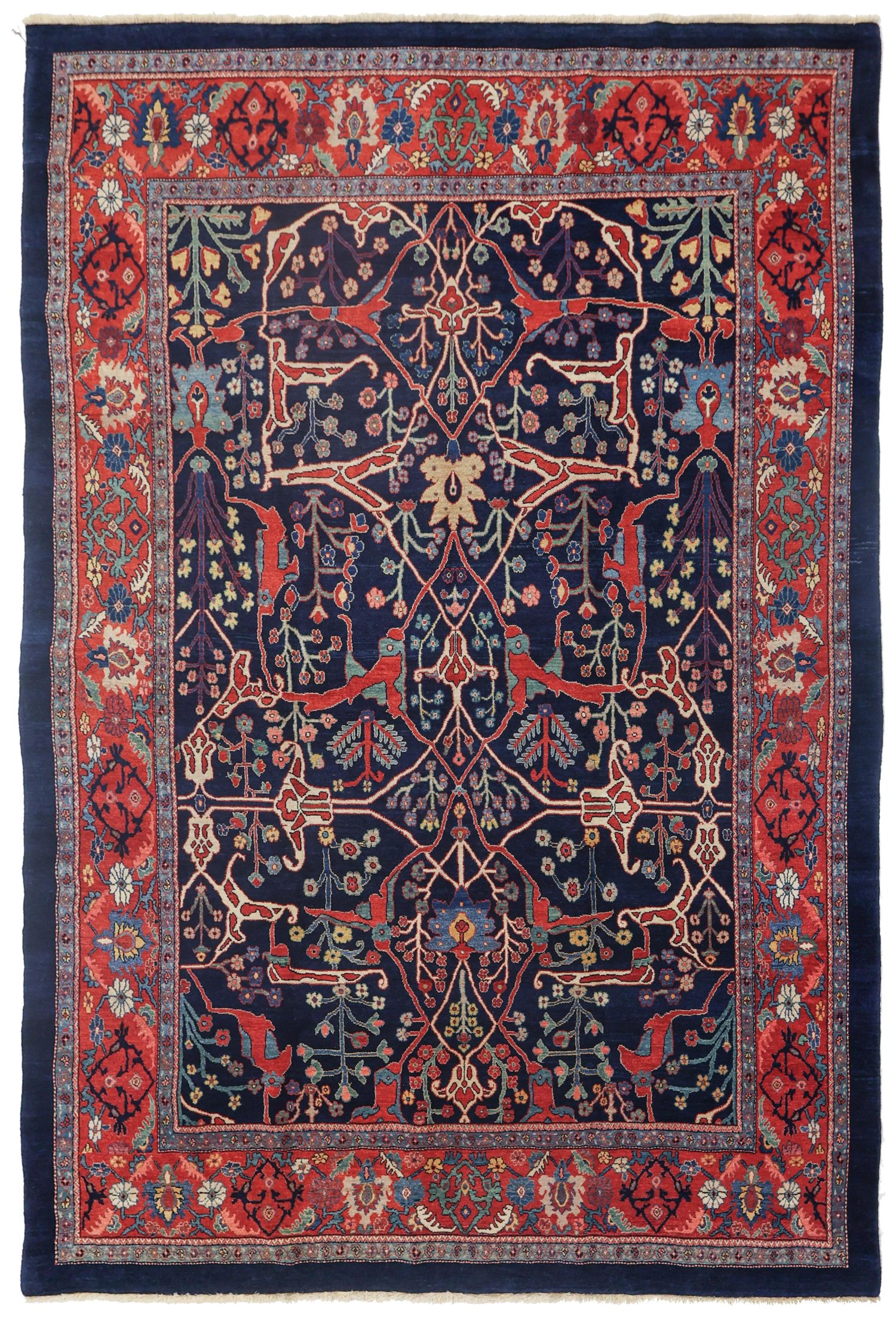 Boston area based Douglas Stock Gallery offers a carefully selected group of contemporary, hand woven Oriental rugs and room size Oriental carpets utilizing natural dyes and hand spun wool. This contemporary Bidjar carpet features the famous Split Arabesque design, one of the most important formats seen in 19th century antique Bidjar carpets, on a navy blue field that is framed by a red border with light blue guard borders. The green, yellow and sky blue highlights contribute to this being an exceptionally beautiful example.