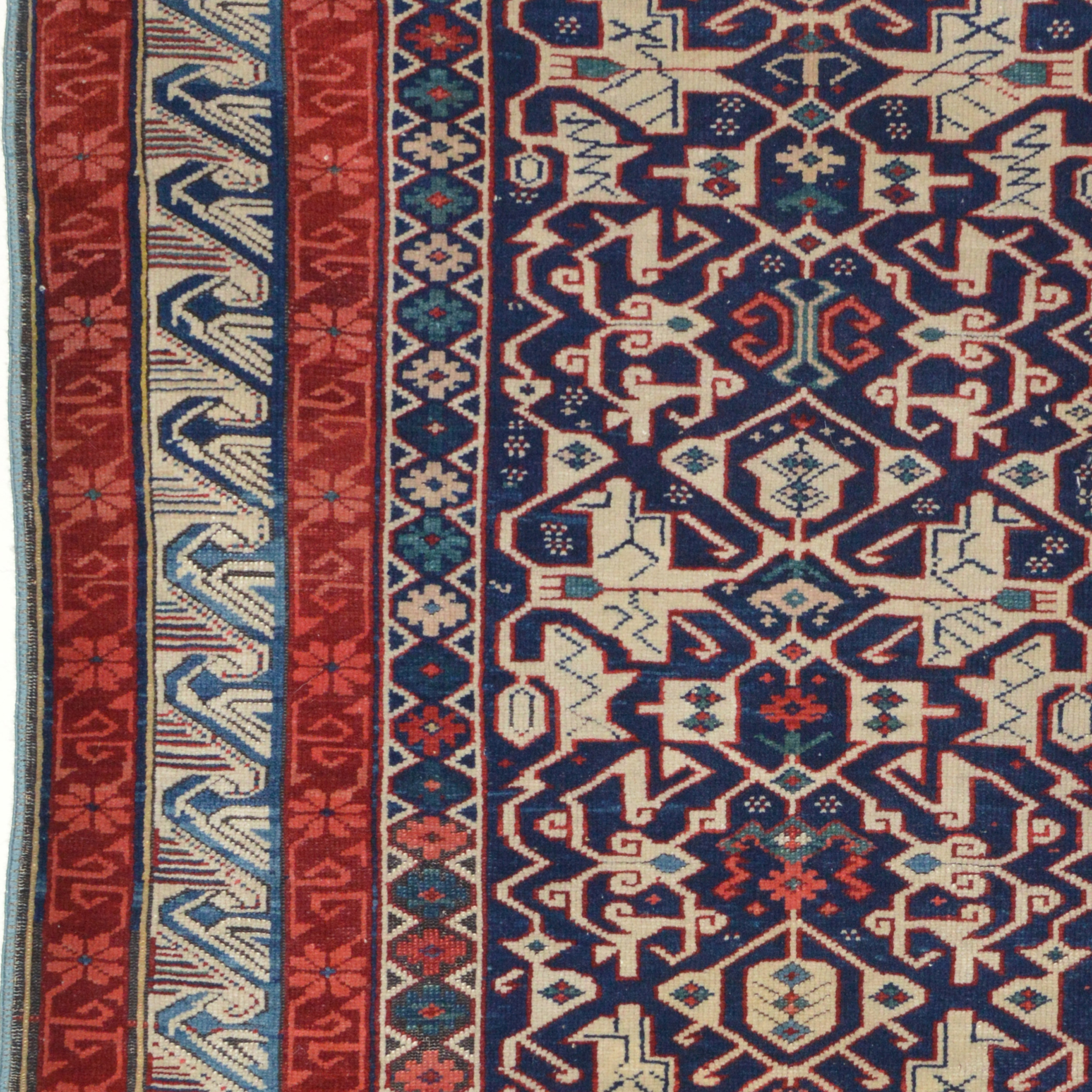 Detail of a Konagend style field design and Seychour border system in an antique northeast Caucasian Kuba rug. Douglas Stock Gallery is one of America's most respected dealers in antique Oriental rugs. Antique rugs Boston,MA area, antique rugs New York by appointment, antique rugs Washington,DC by appointment. Antique Caucasian rugs Boston,MA area