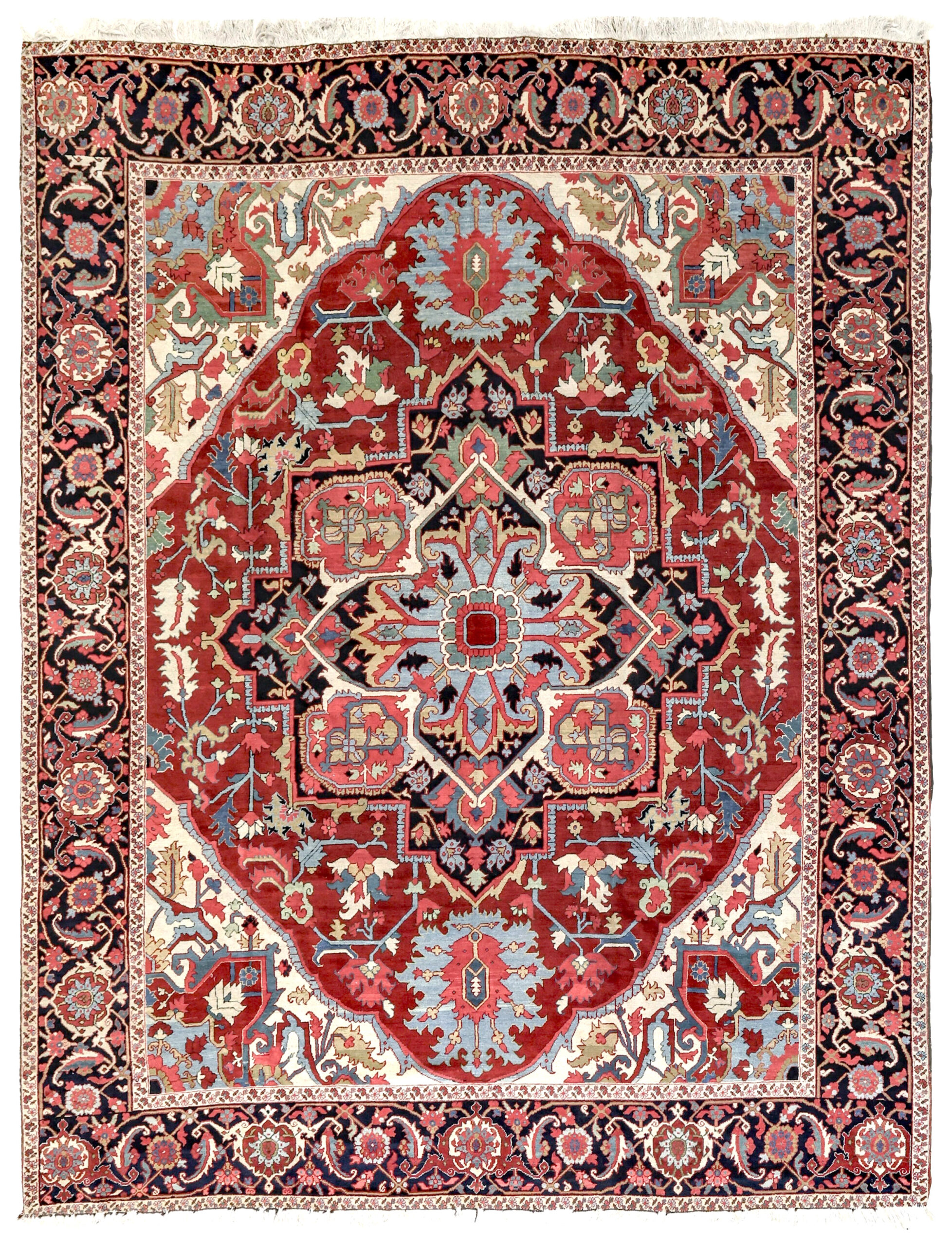 A finely woven antique Heriz carpet, circa 1900. The brick red field is decorated with a navy blue and coral medallion and framed by ivory corner spandrels and a navy blue Turtle design border. Douglas Stock Gallery specializes in antique Heriz, "Serapi", Karaja and Bakshaish carpets woven in the Heriz district in northwest Persia's Azerbaijan province in the late 19th and early 20th centuries. Antique Oriental rugs Boston,MA area