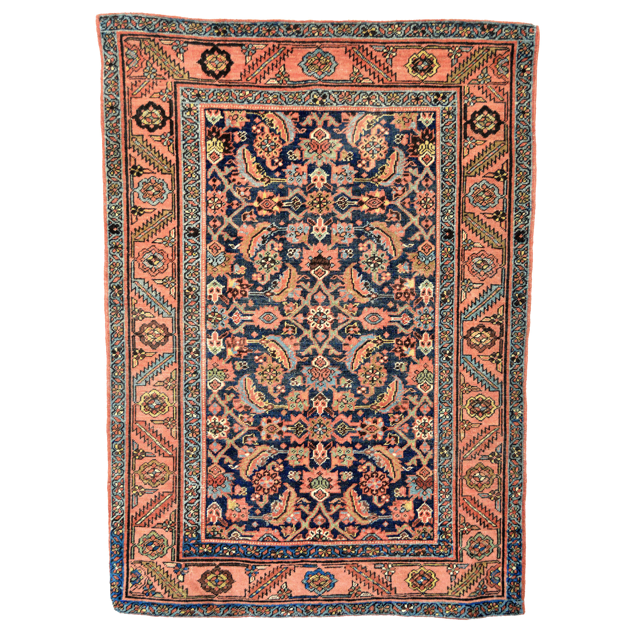 An antique Heriz rug with a navy blue field that is decorated with the classical "Herati" design and framed by a coral color border with leaves and flowers, northwest Persia, circa 1915. Douglas Stock Gallery, antique Persian rugs Boston, Beacon Hill, Back Bay, V=Brookline, Newton, Weston, Wesley, Natick,MA area New England