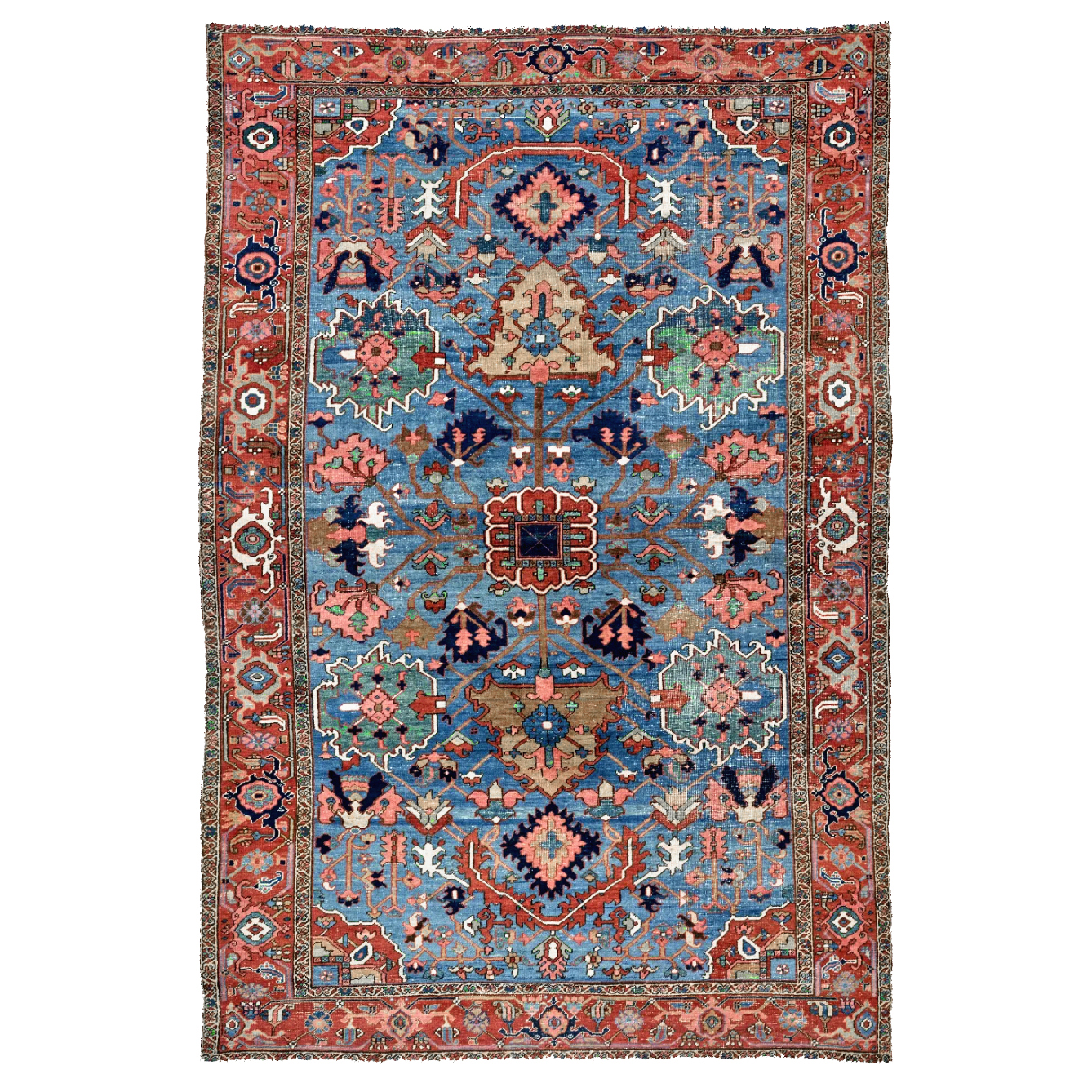A distinctive and beautifully colored antique Heriz carpet with a denim blue field decorated with palmettes and flowers, northwest Persia, circa 1900. Douglas Stock Gallery specializes in antique Heriz, "Serapi", Karaja and Bakshaish rug and room size carpets