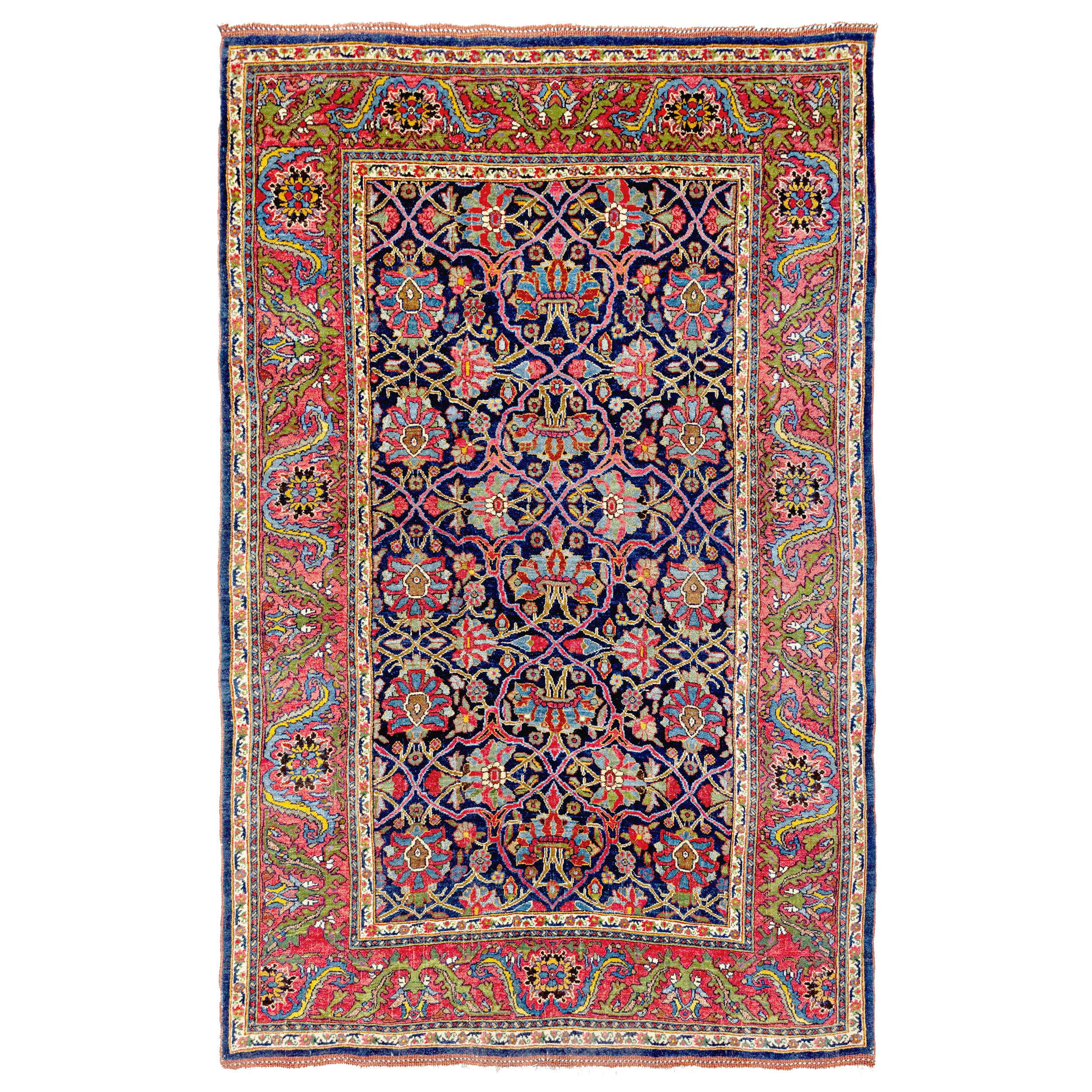 An antique Persian Bidjar rug with a complex Quatrefoil Lattice design on a navy blue field. A coral color border with large green leaves frames the field. Northwest Persia, circa 1910. Douglas Stock Gallery is one of New England's finest dealers in antique Bidjar (Bijar) rugs and room size Bidjar carpets.